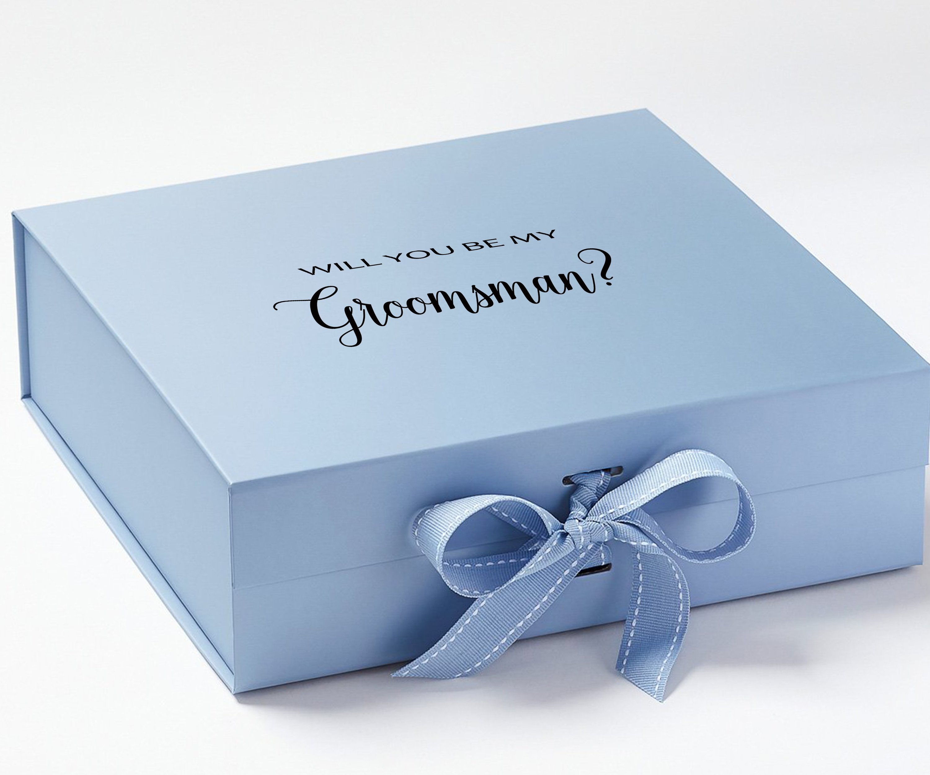 Light blue groomsman proposal box with metallic writing and bow, showcasing its elegant design and luxurious finish.