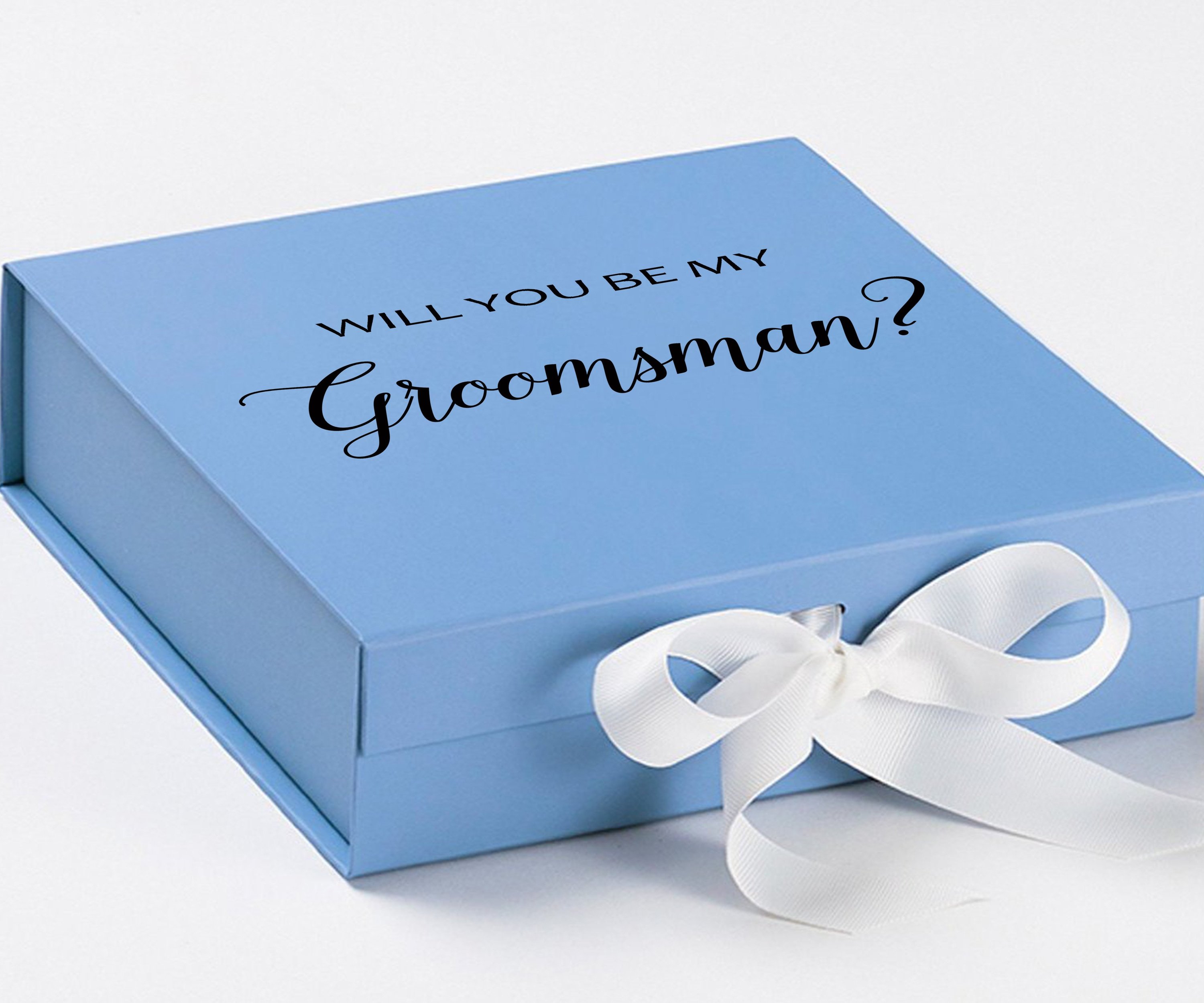 Light blue groomsman proposal box with white bow and metallic writing on the lid, showcasing its elegant design.