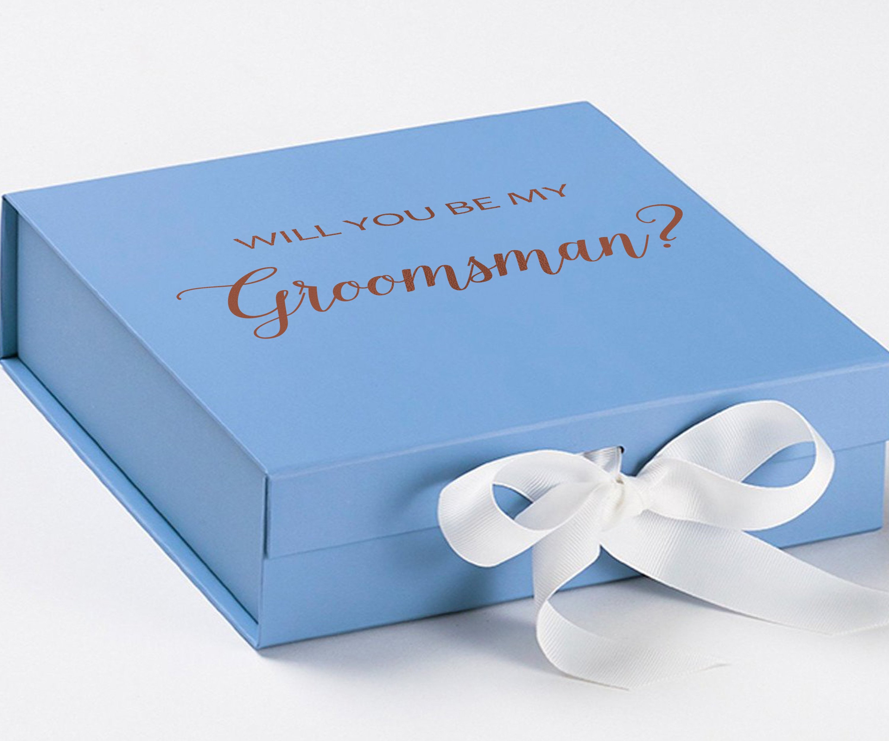 Light blue groomsman proposal box with white bow and metallic writing on the lid, showcasing its elegant design.