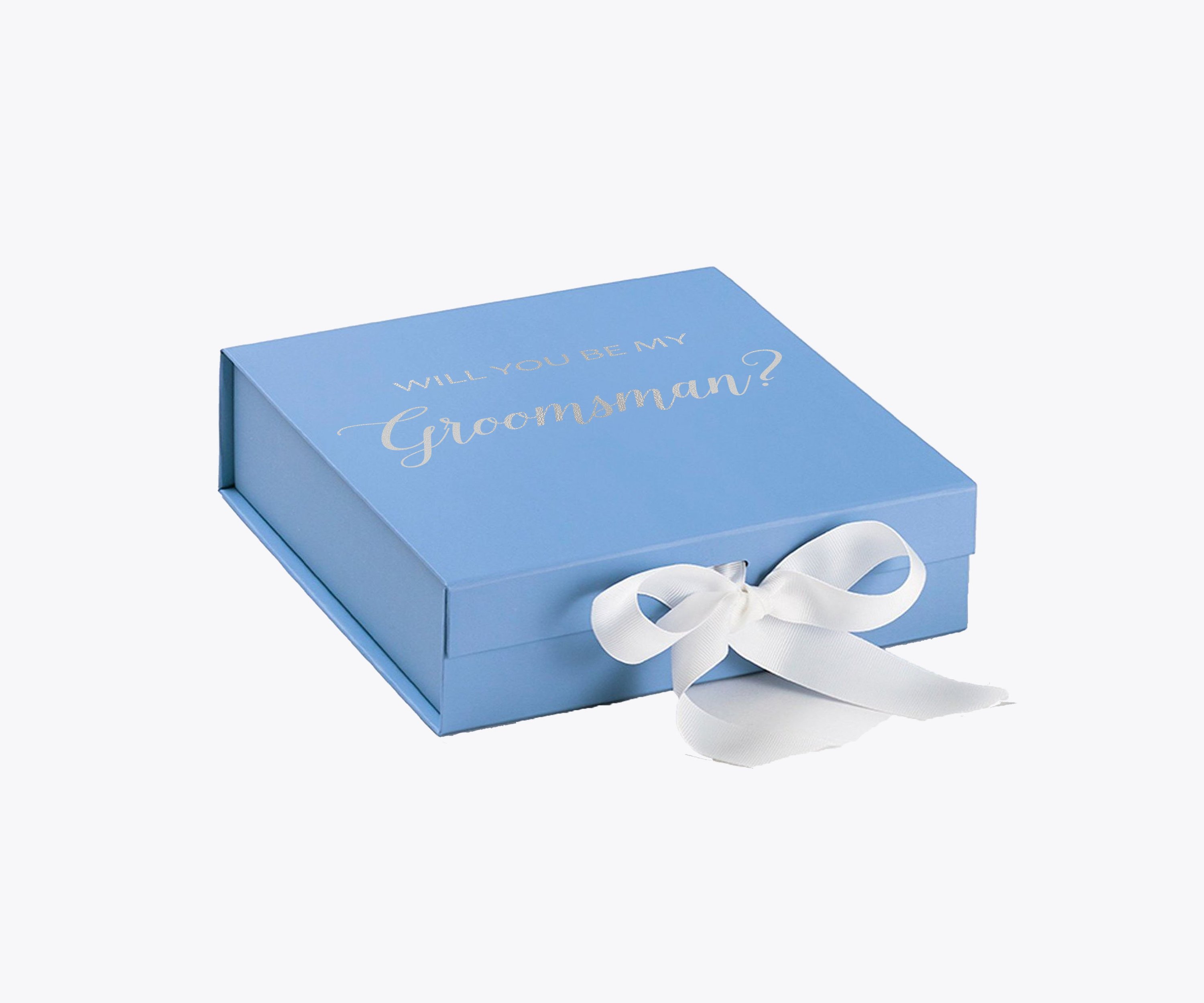 Light blue groomsman proposal box with white bow and metallic writing on the lid, showcasing its elegant design.