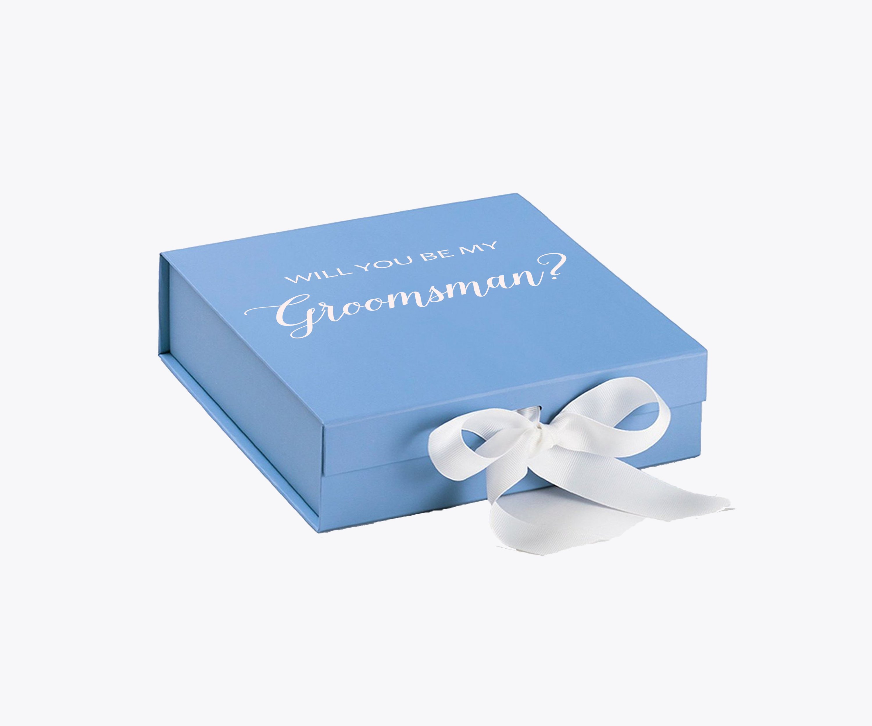 Light blue groomsman proposal box with white bow and metallic writing on the lid, showcasing its elegant design.