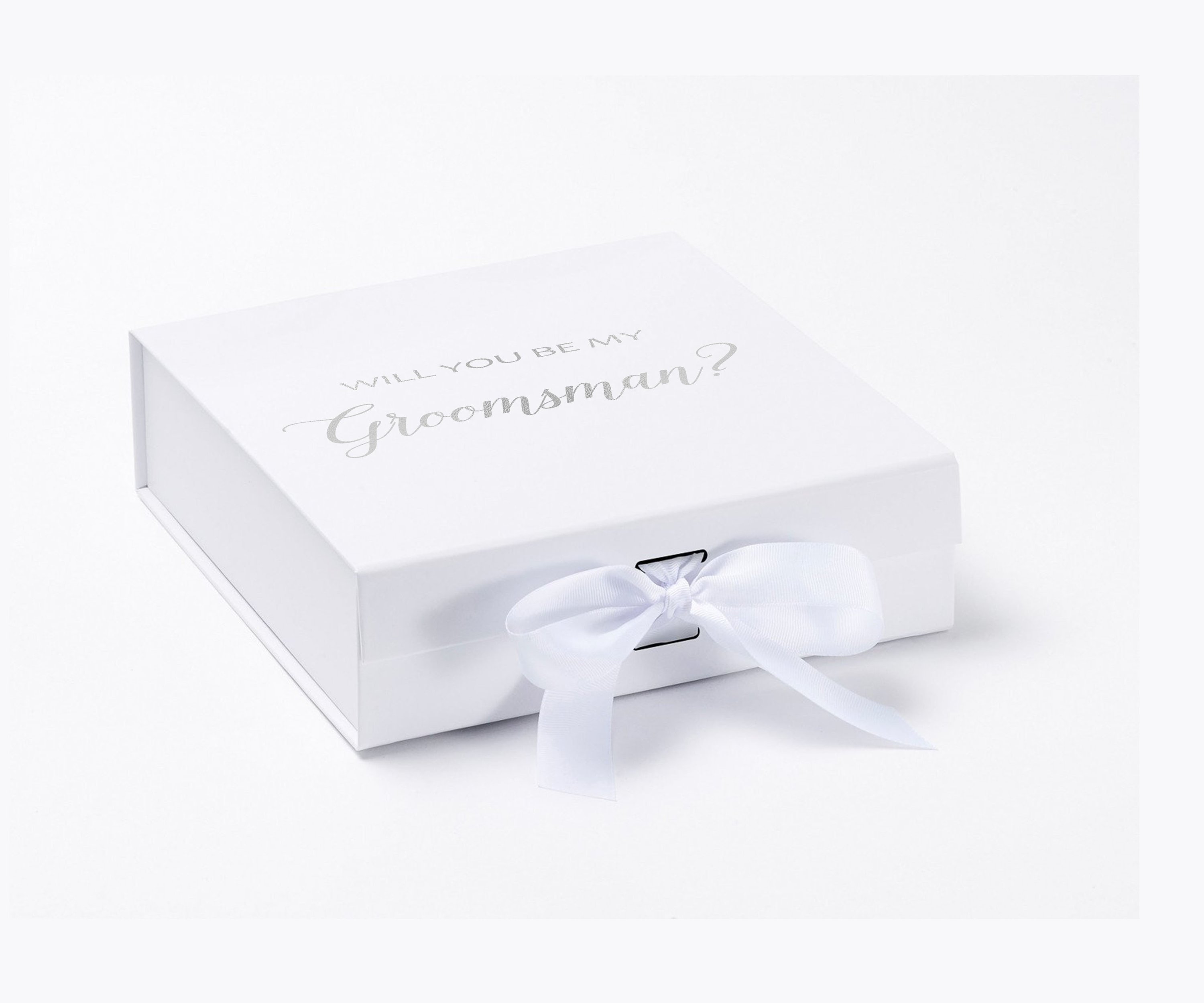 Elegant white groomsman proposal box with metallic writing and a white bow, showcasing its luxurious design.