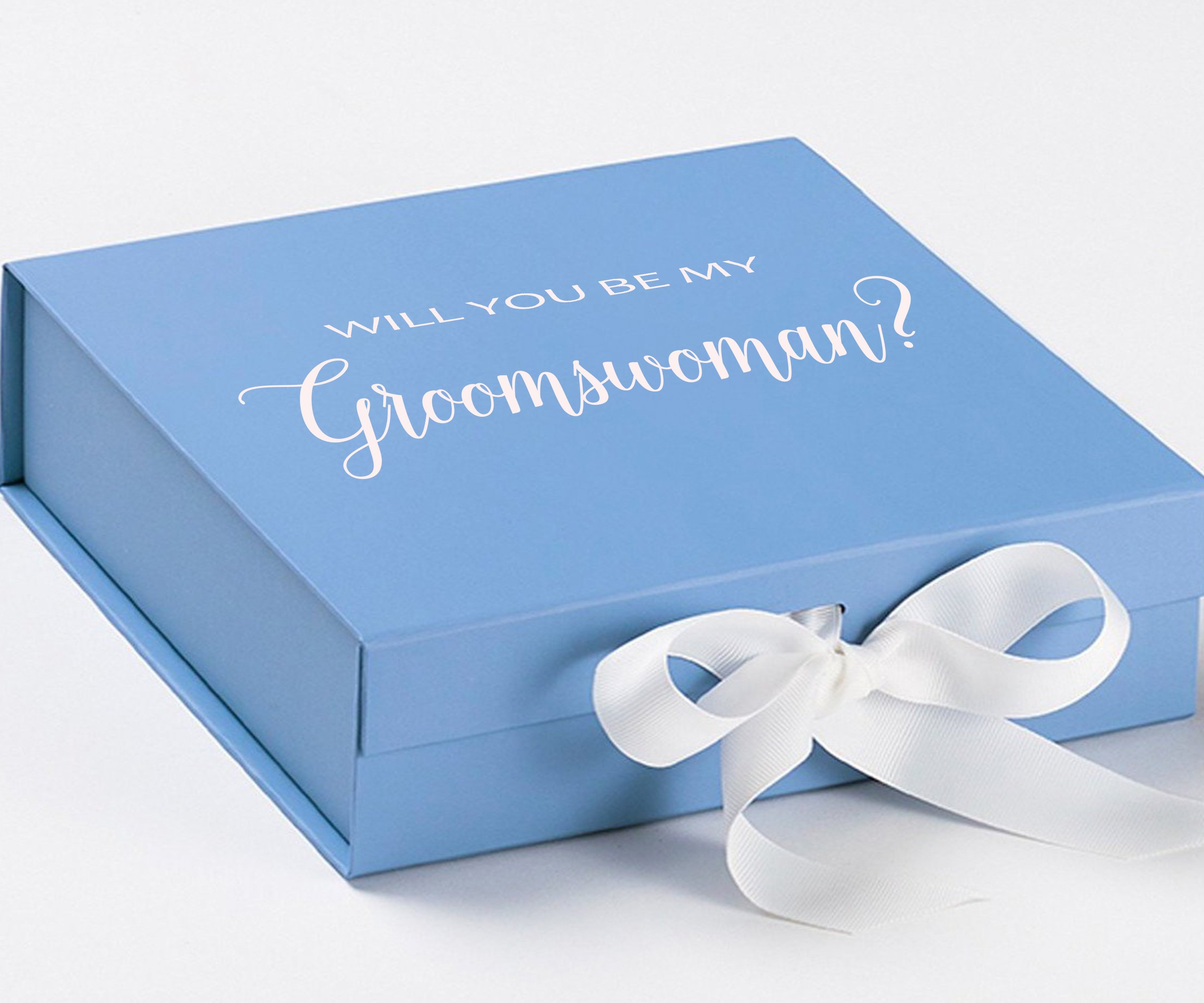 Light blue proposal box with white bow and metallic writing, showcasing elegant design for groomswoman proposal.