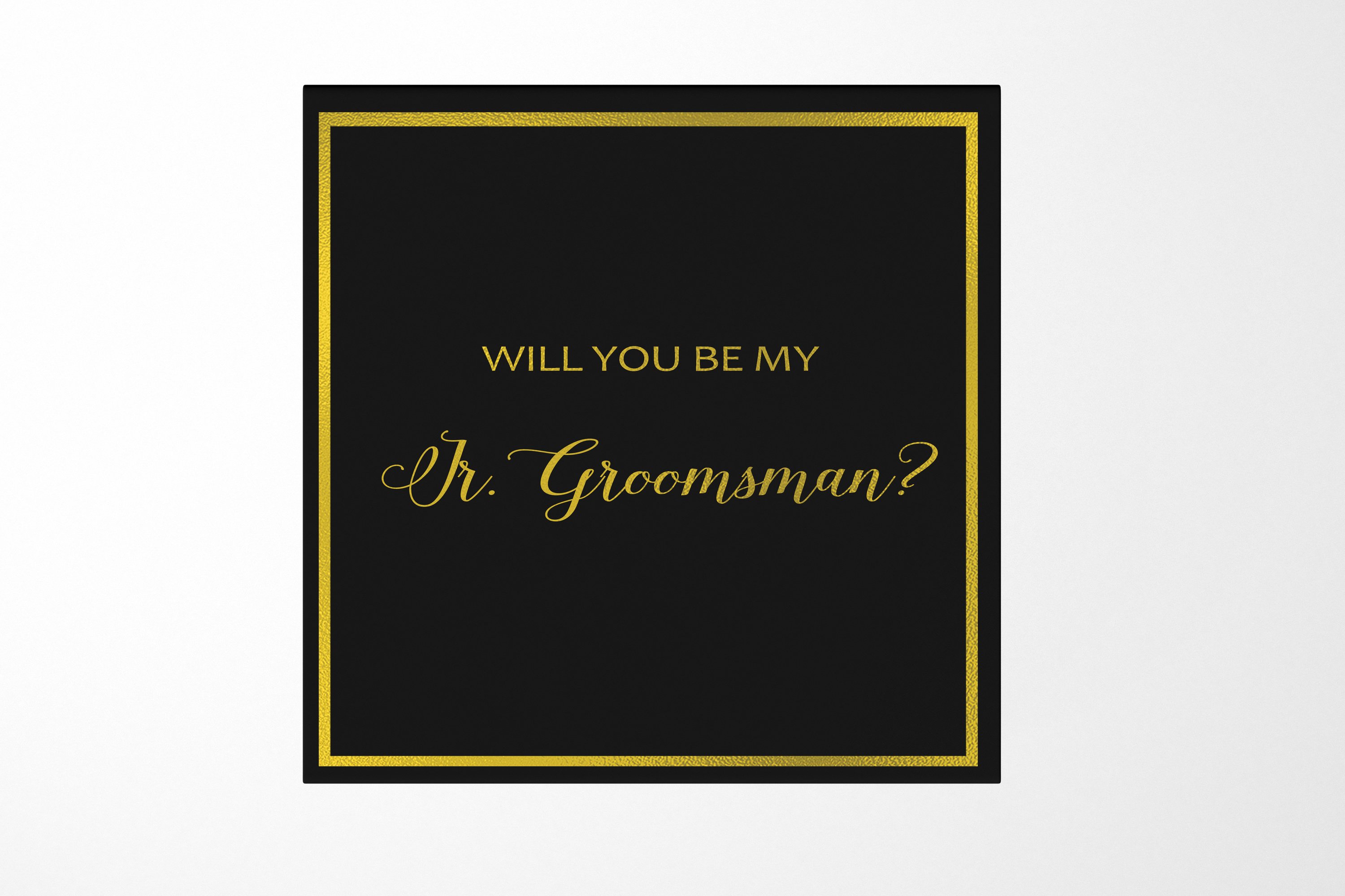 Elegant black proposal box with metallic writing for junior groomsman invitation, featuring a sleek design and magnetic closure.