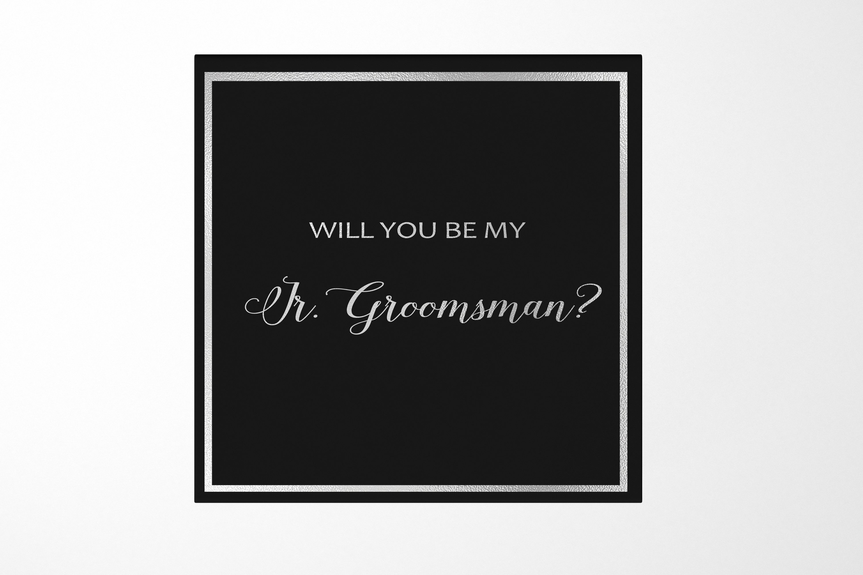 Elegant black proposal box with metallic writing for junior groomsman invitation, featuring a sleek design and magnetic closure.