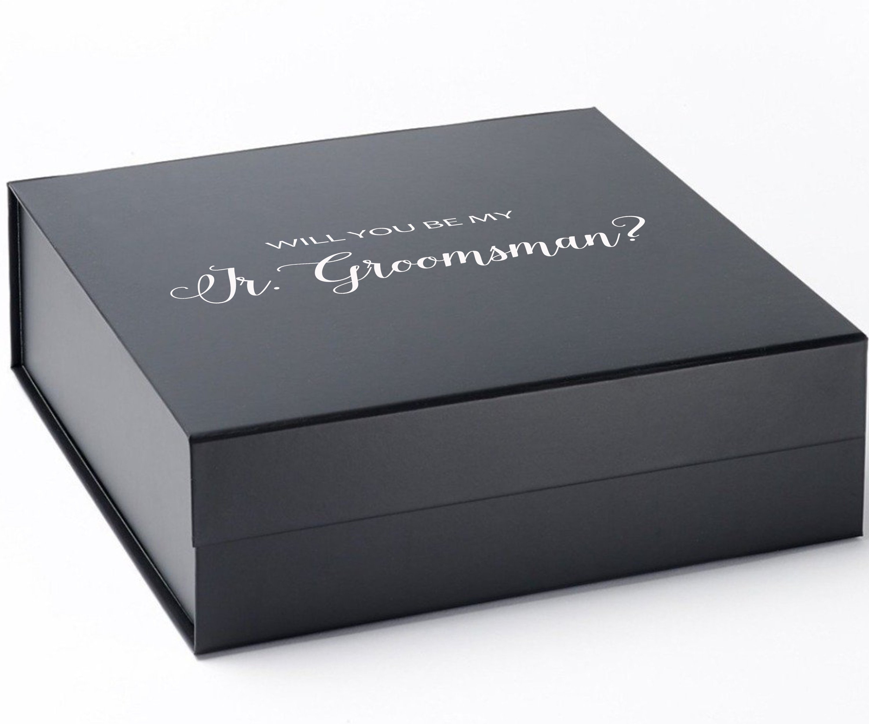 Elegant black proposal box for junior groomsman with metallic writing on the lid, showcasing a sleek design without borders.