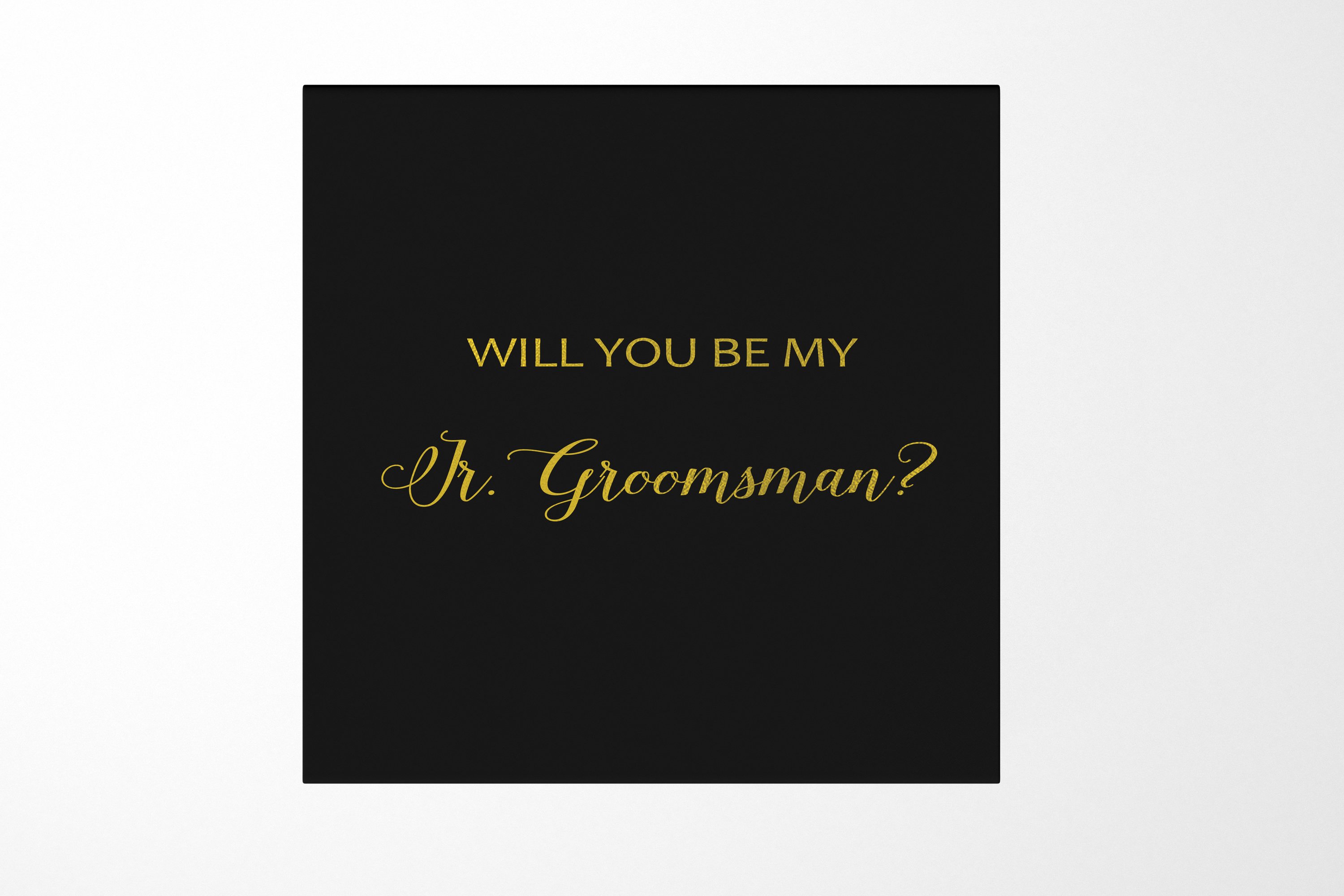 Elegant black proposal box for junior groomsman with metallic writing on the lid, showcasing a sleek design without borders.