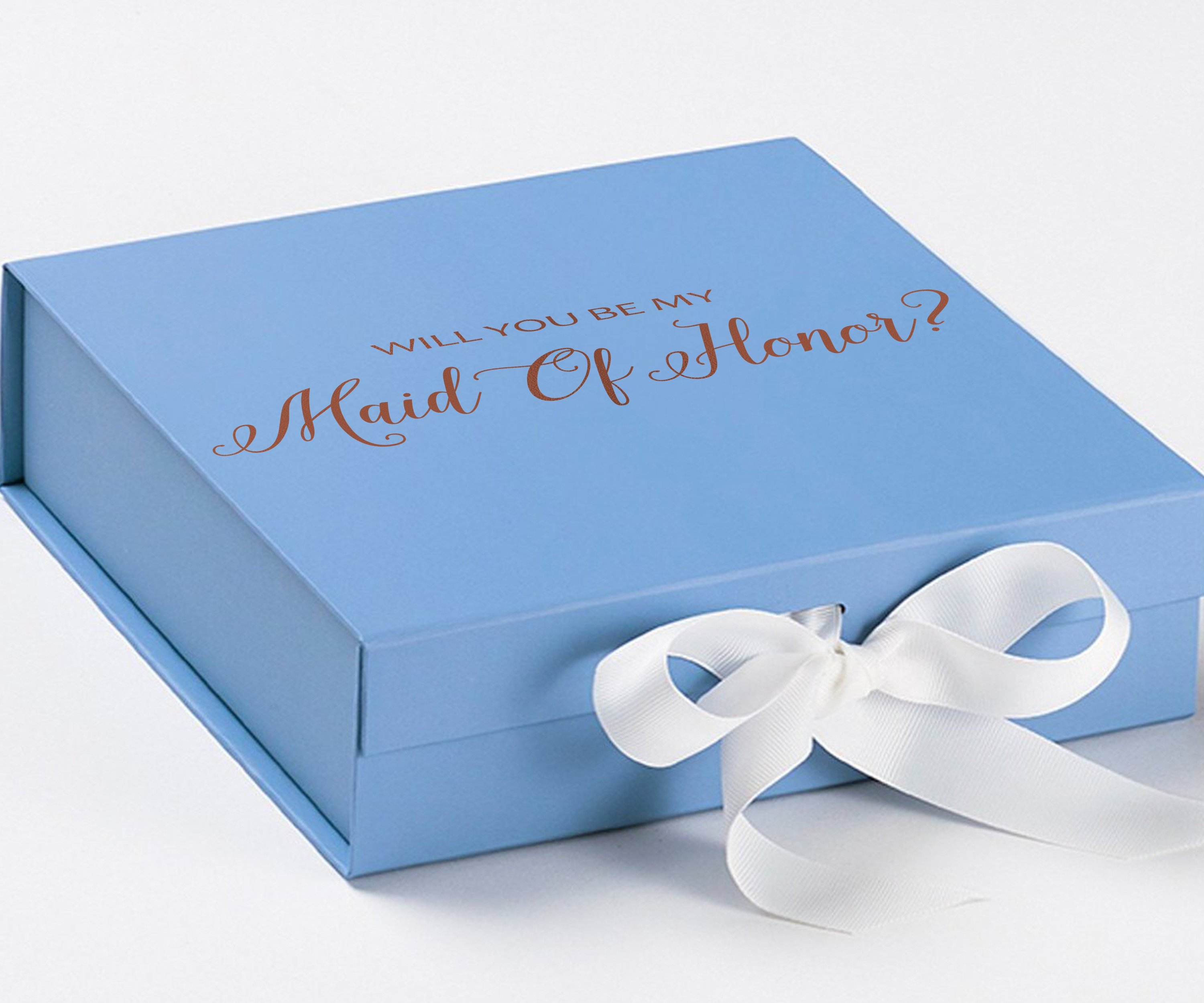 Light blue proposal box with white bow and metallic writing, perfect for asking someone to be your maid of honor.