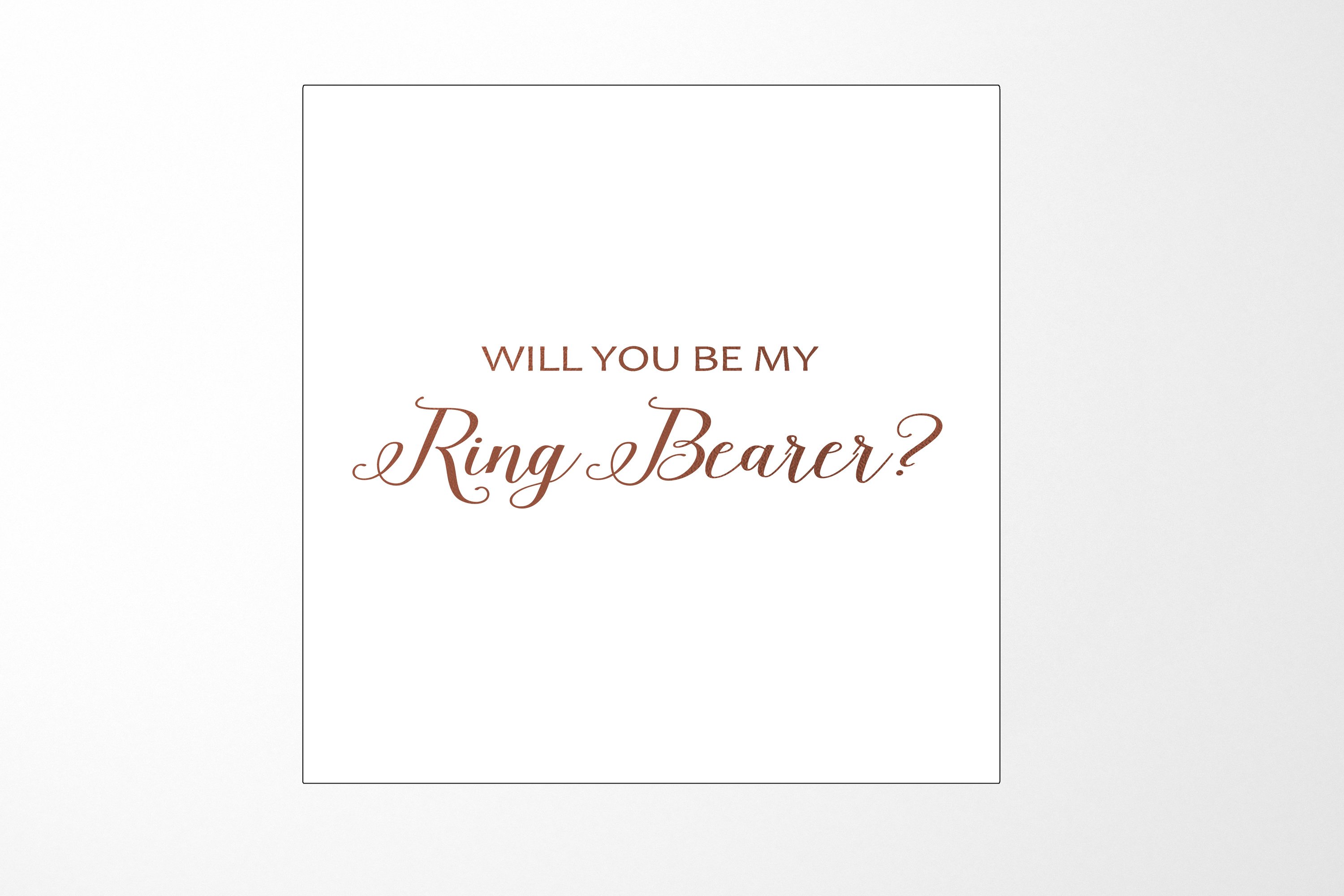 Elegant white proposal box with metallic writing, showcasing a sleek design for ring bearer proposal.