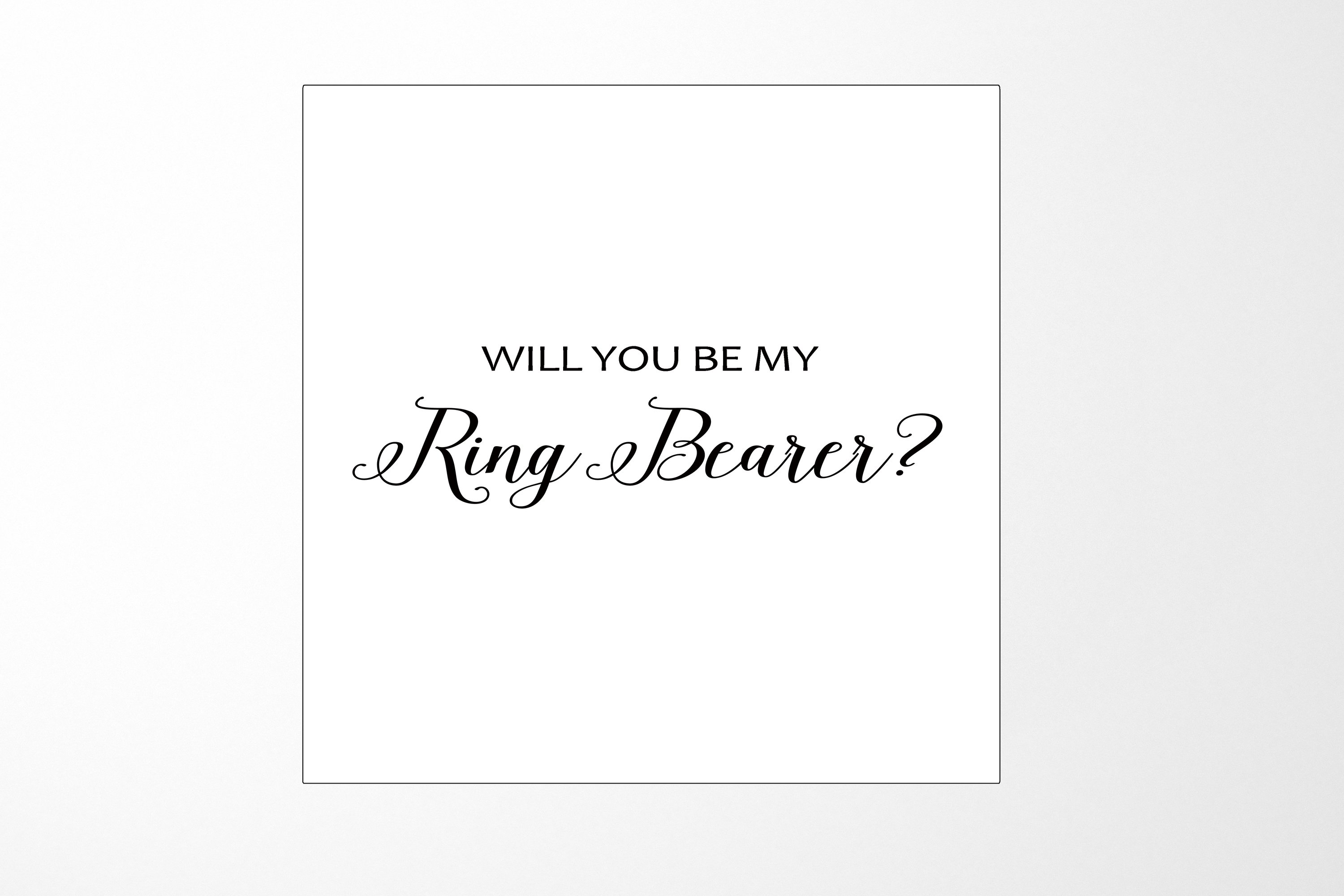 Elegant white proposal box with metallic writing, showcasing a sleek design for ring bearer proposal.