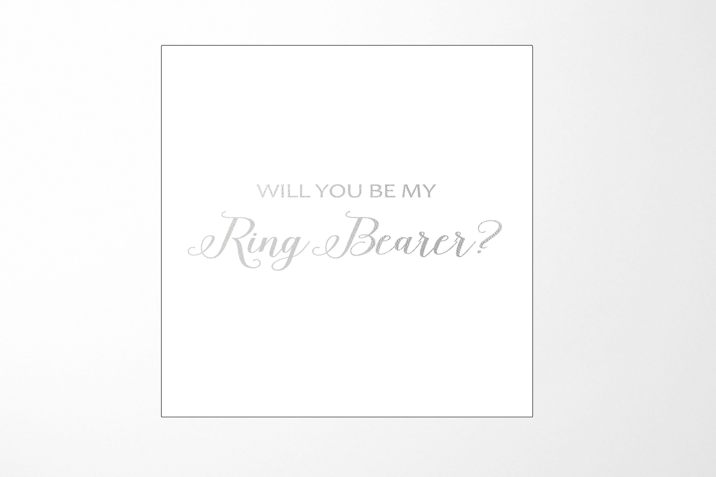 Elegant white proposal box with metallic writing, showcasing a sleek design for ring bearer proposal.