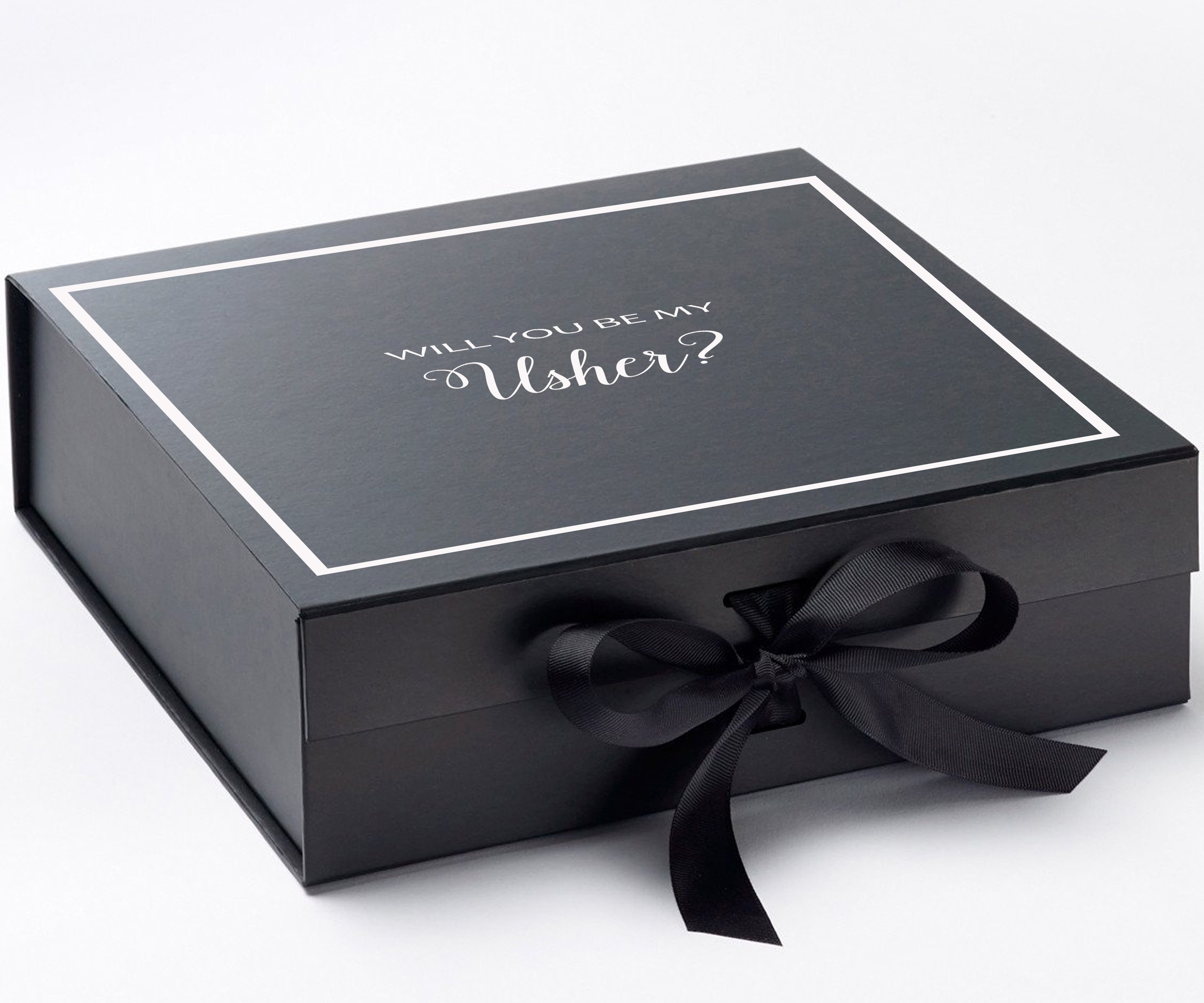 Black proposal box with metallic writing, featuring a black bow and elegant design.