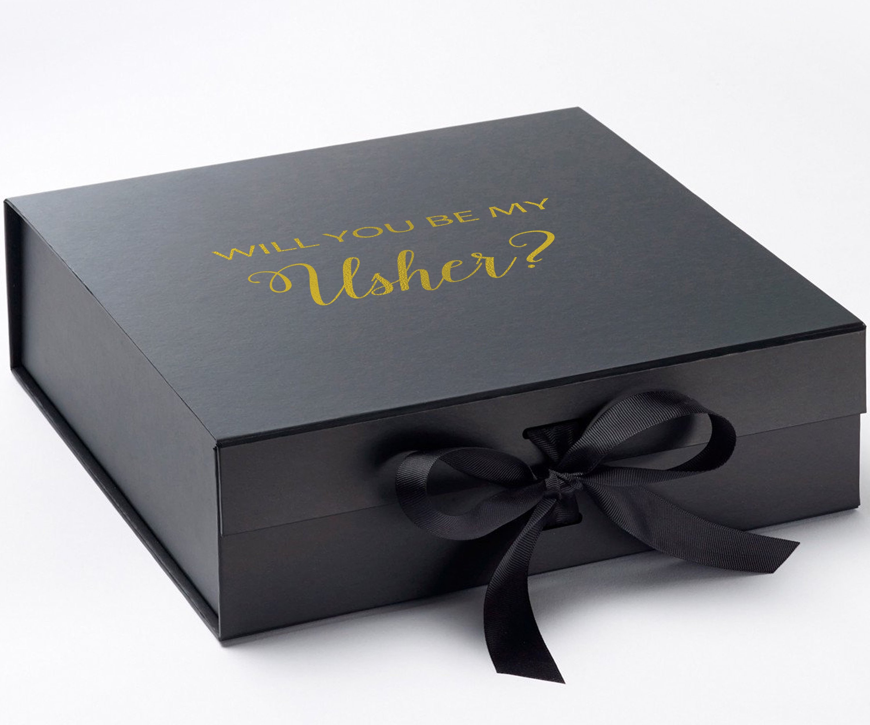 Elegant black proposal box with metallic writing and black bow, showcasing a luxurious design.