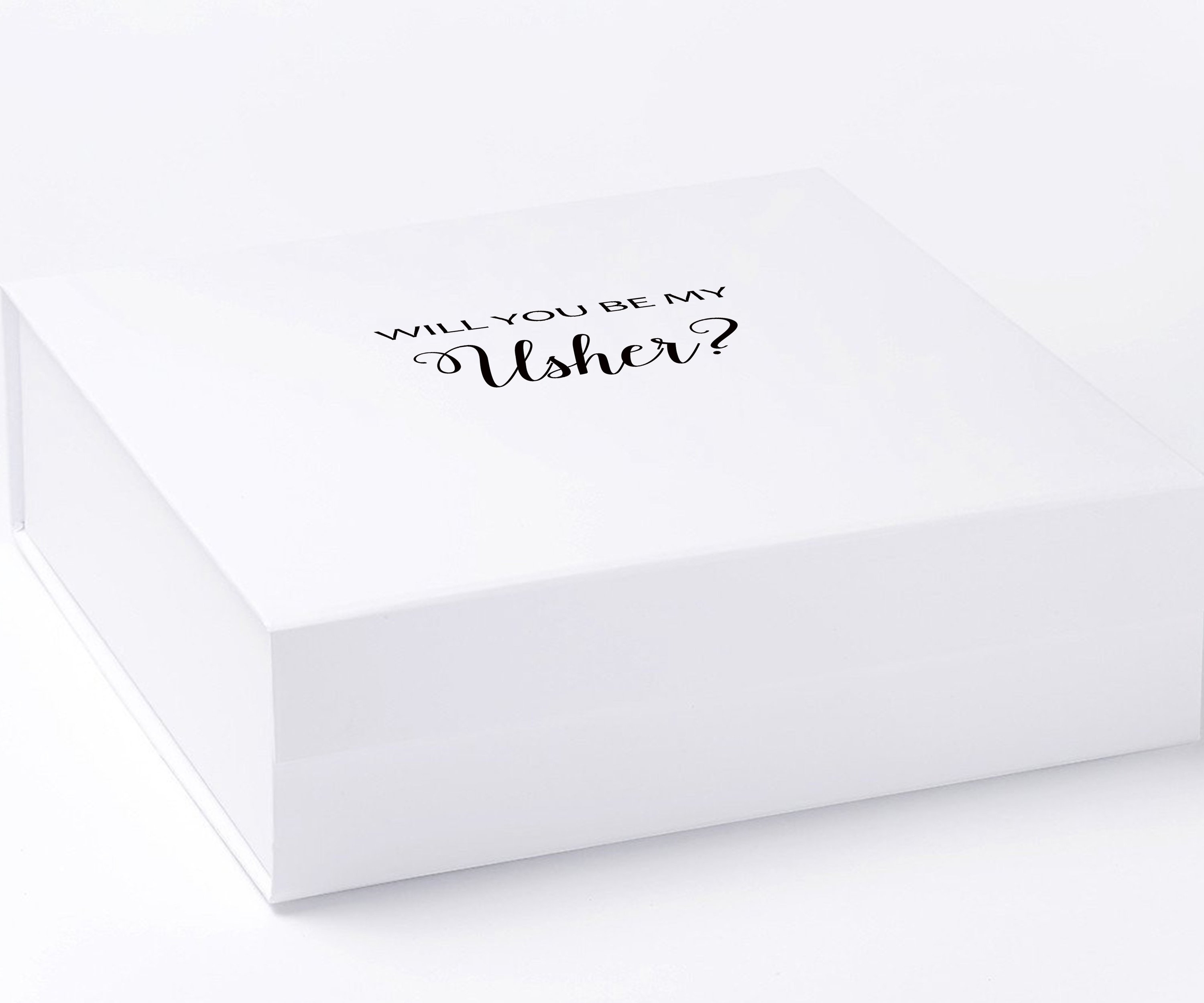 White proposal box with metallic writing on the lid, featuring a minimalist design without borders or ribbons.