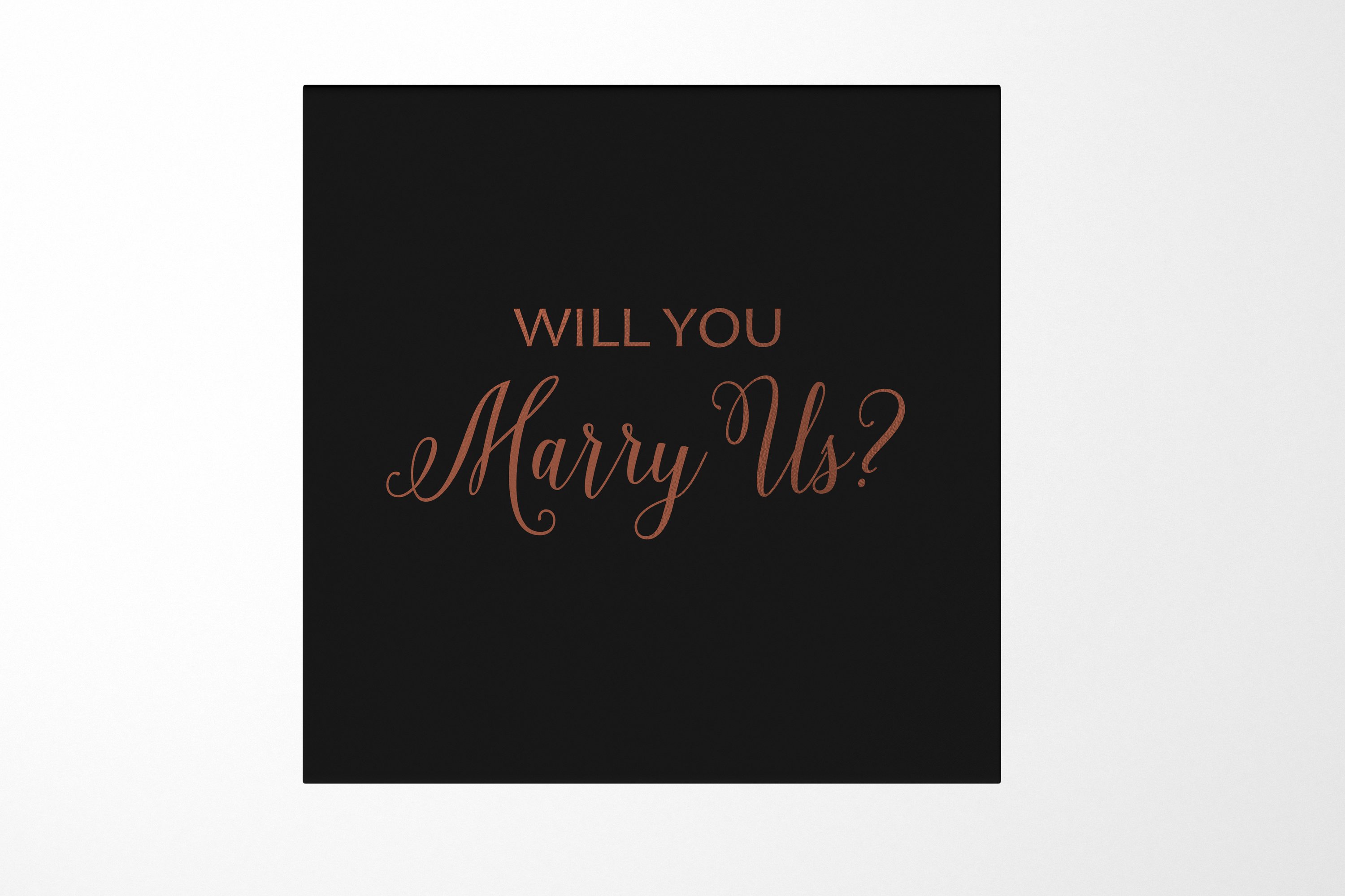 Elegant black proposal box with metallic writing, showcasing a sleek design without ribbon or border.