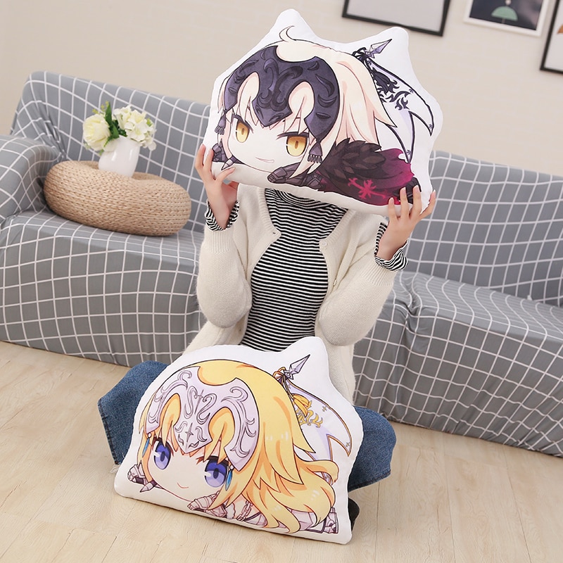 Person holding character cushions.