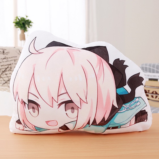 Chibi anime character on pillow.