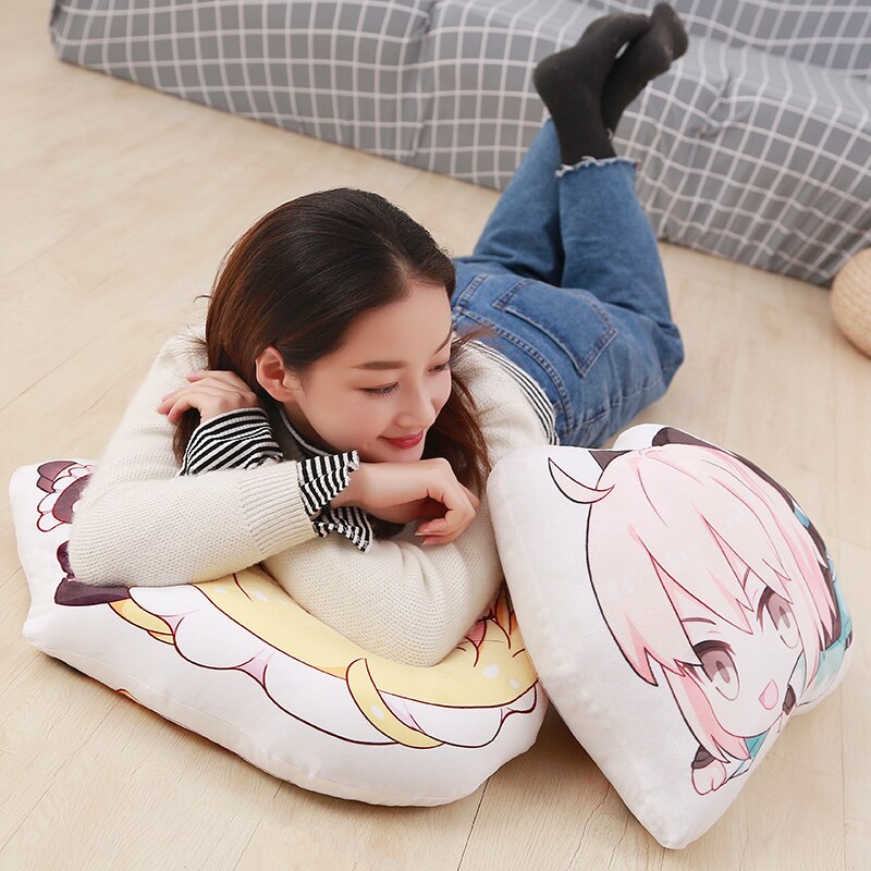 Woman resting on cartoon pillows.