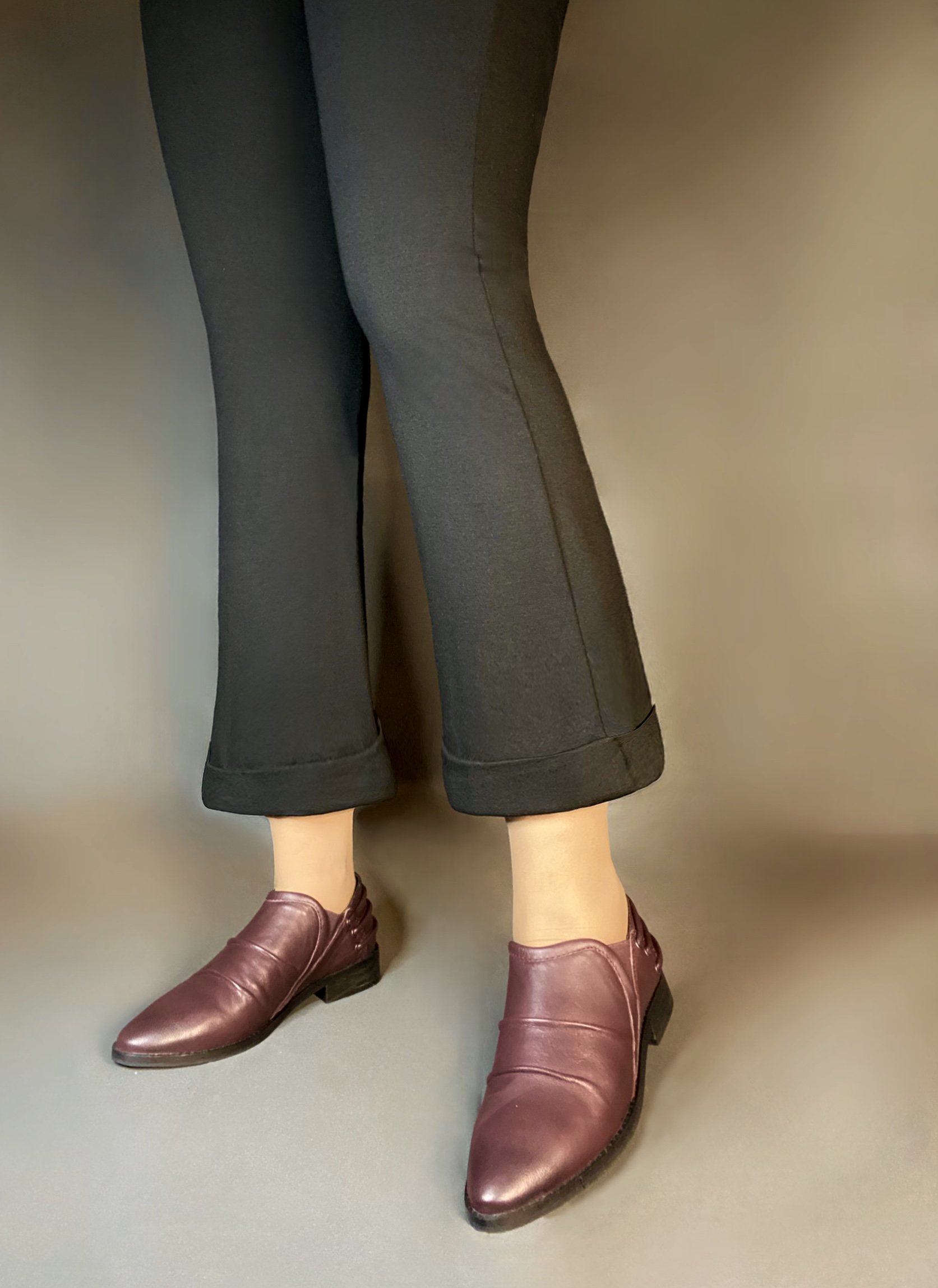 Annie Burgundy Dress Loafer showcasing elegant leather design, slouchy upper, decorative back cords, and low block heel.