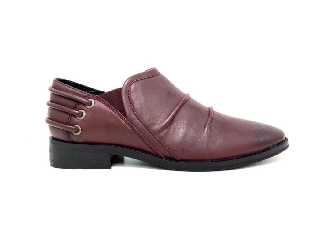 Annie Burgundy Dress Loafer showcasing elegant leather design, slouchy upper, decorative back cords, and low block heel.