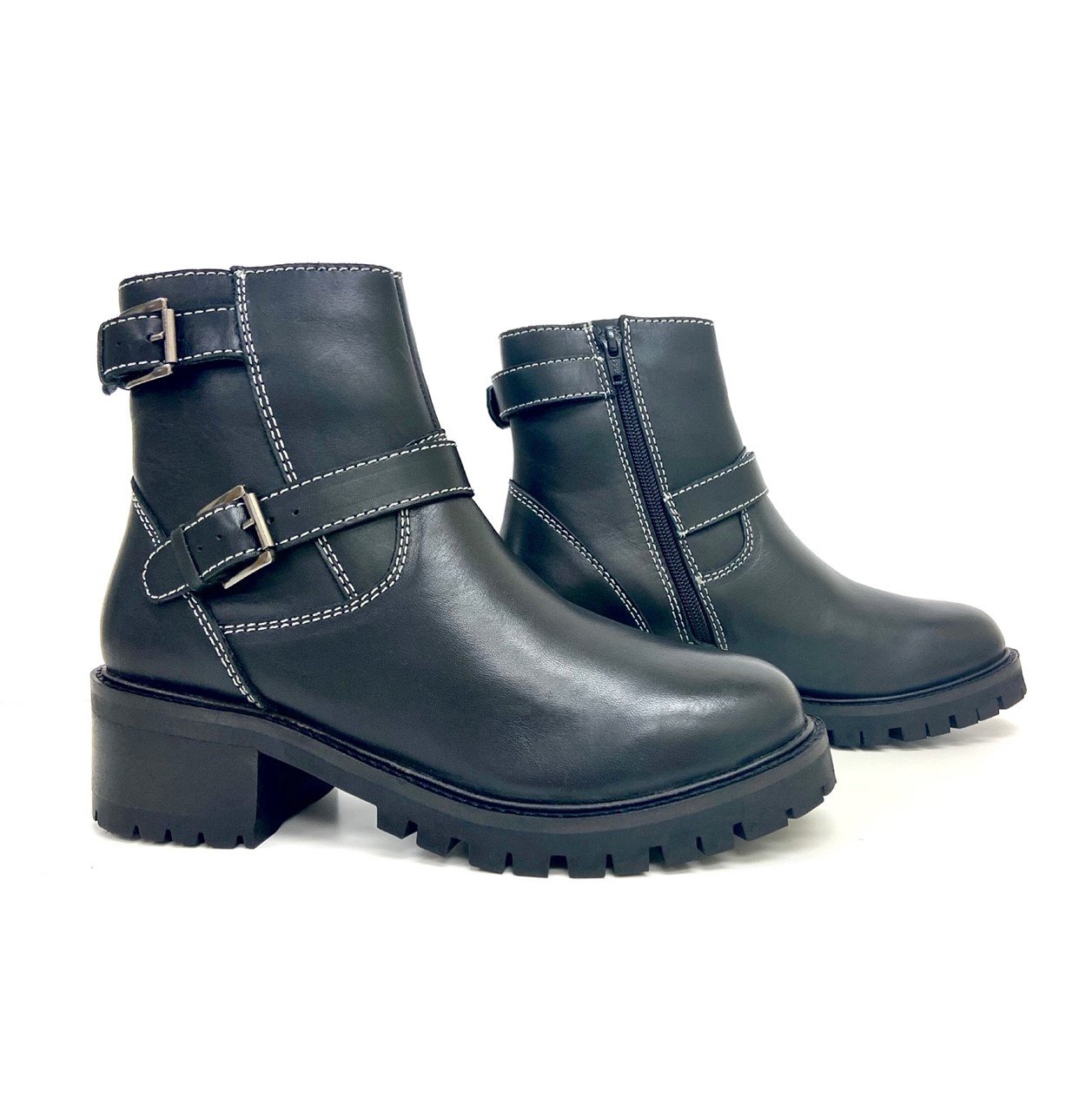 A pair of stylish Terminator Black Platform Block Heel Booties featuring a sleek leather upper, slip-resistant rubber block heels, and side zippers for easy wear.