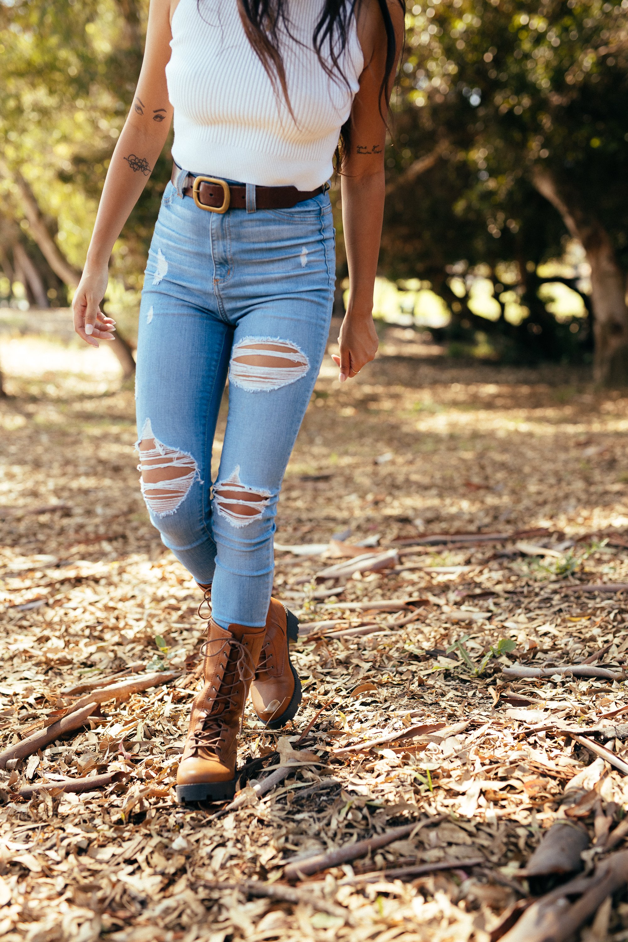 A pair of stylish Women's Private Boots in camel color, featuring a round toe, lace-up vamp, inner zip closure, and durable lug sole, perfect for any outfit.