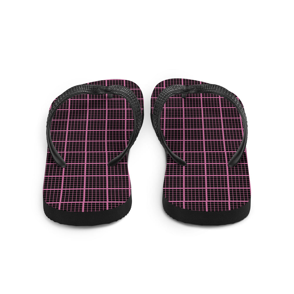 Black and pink check chequered flip-flops with rubber sole and Y-shaped straps, perfect for summer wear.