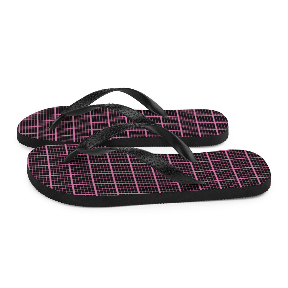 Black and pink check chequered flip-flops with rubber sole and Y-shaped straps, perfect for summer wear.