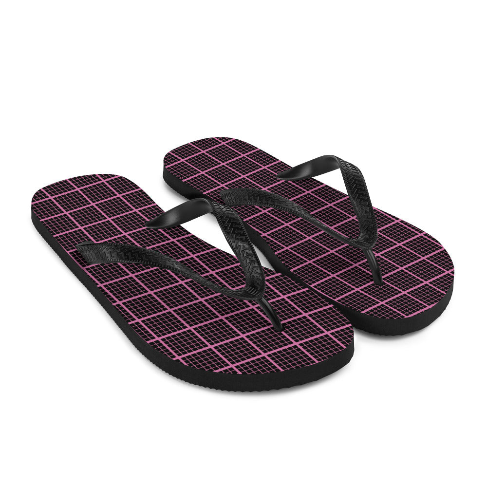 Black and pink check chequered flip-flops with rubber sole and Y-shaped straps, perfect for summer wear.