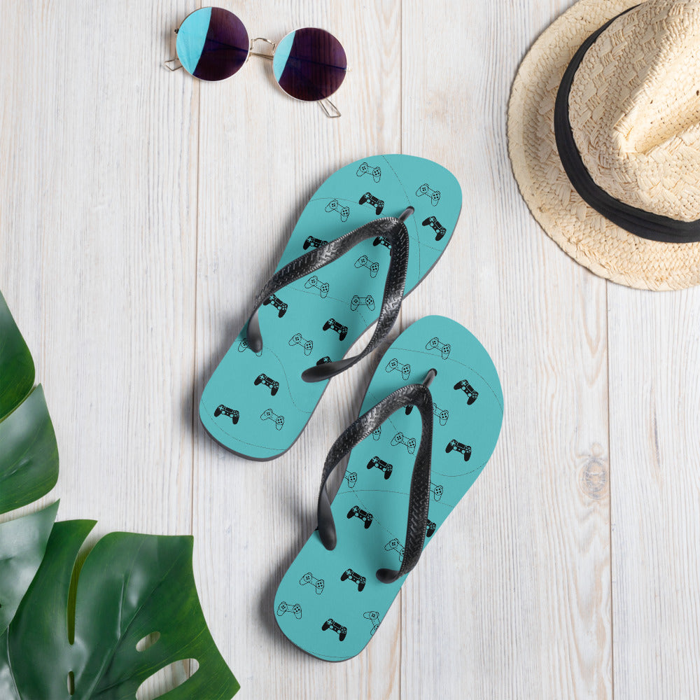 Gamer Blue Flip-Flops featuring a rubber sole, customizable polyester lining, and black Y-shaped straps, perfect for summer wear.