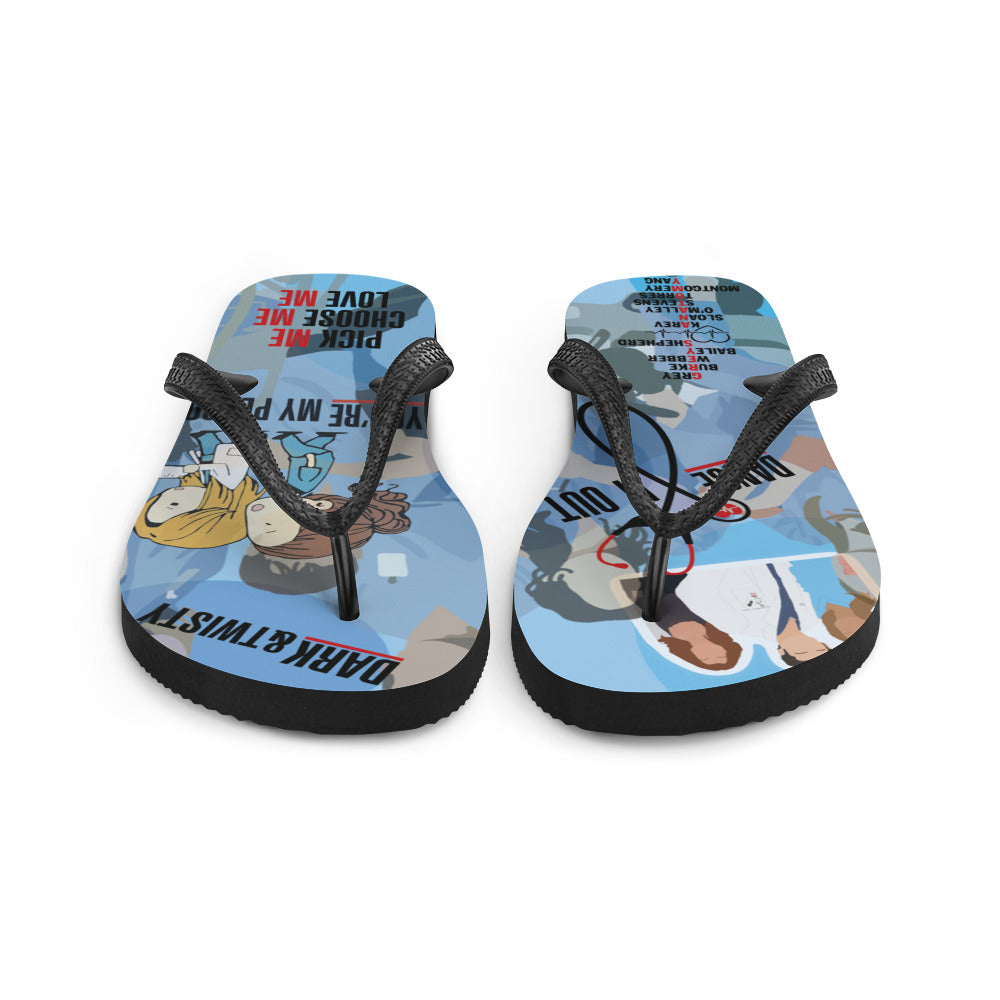 A pair of colorful Greys Flip-Flops with black Y-shaped rubber straps and soft fabric lining, perfect for summer adventures.