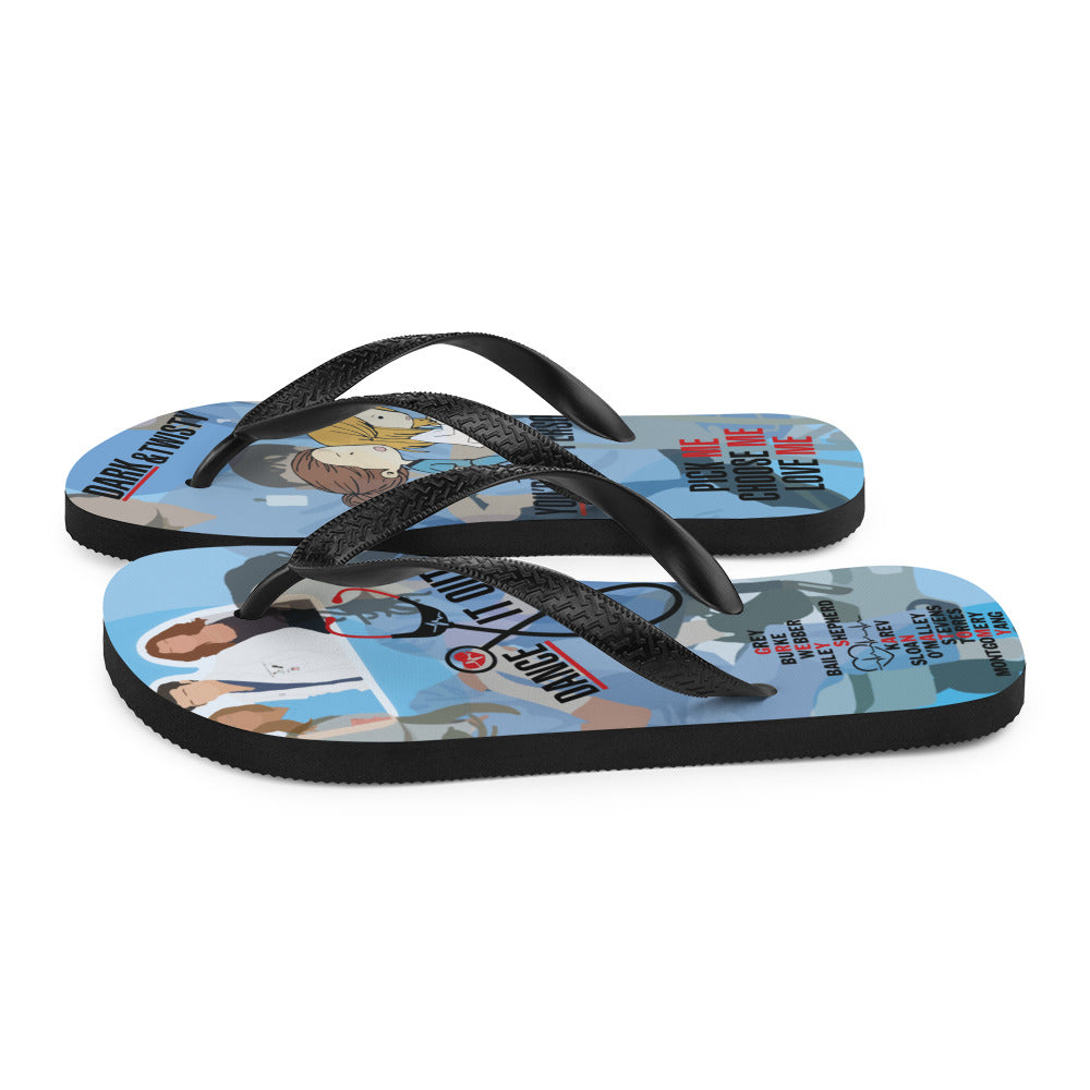 A pair of colorful Greys Flip-Flops with black Y-shaped rubber straps and soft fabric lining, perfect for summer adventures.