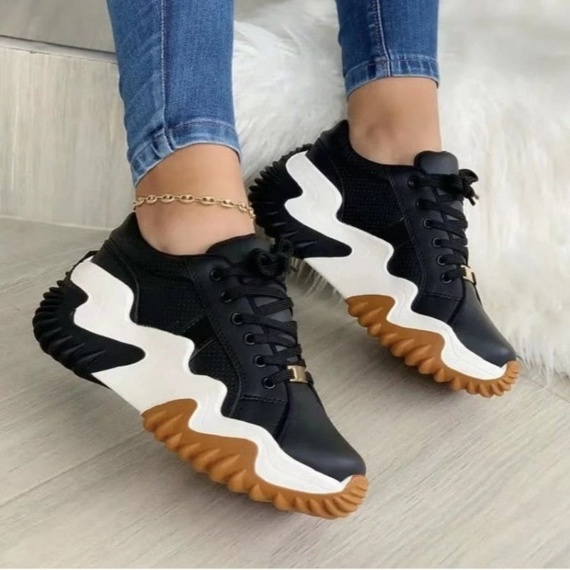 A pair of stylish Thick Bottom Canvas Casual Shoes for women, featuring a breathable canvas upper and a thick cushioned sole, perfect for summer outings.