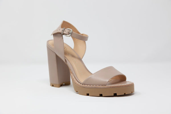 A pair of Anna Tony Leather Sandals featuring a 4-inch block heel, open toe design, and adjustable quarter strap, set against a neutral background.