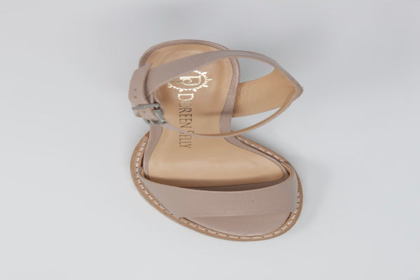 A pair of Anna Tony Leather Sandals featuring a 4-inch block heel, open toe design, and adjustable quarter strap, set against a neutral background.