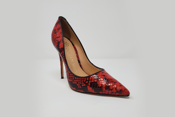 A pair of stylish Meruh Classics pumps featuring a pointed toe and unique venon print, crafted from genuine leather.