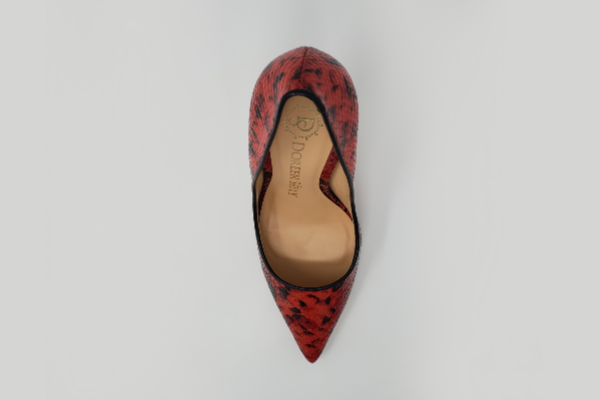 A pair of stylish Meruh Classics pumps featuring a pointed toe and unique venon print, crafted from genuine leather.