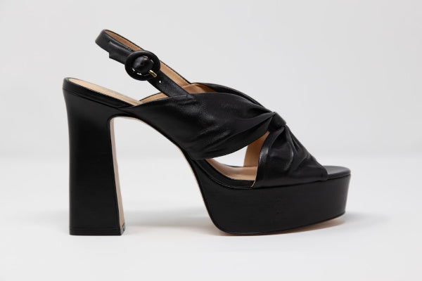 Stella Isidore sandals featuring a stylish block heel and soft genuine leather, perfect for fashion-forward women.