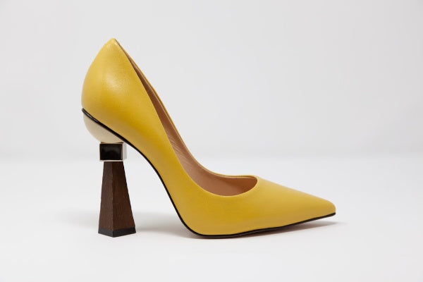 Winnie's Masterpiece pointed toe leather pumps with a geometric sculptural wooden stacked heel, showcasing a sleek design and luxurious Brazilian leather.