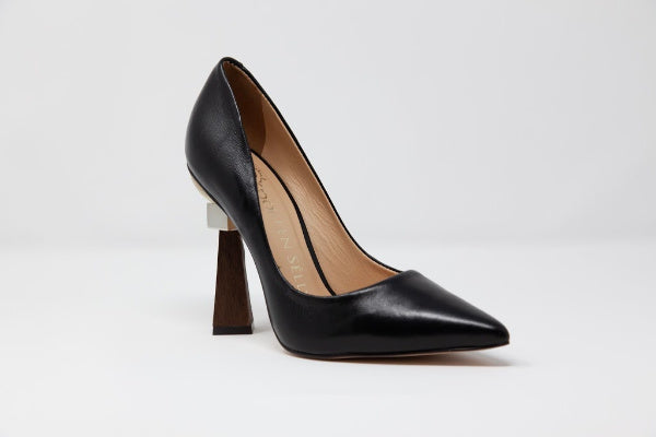 Winnie's Masterpiece pointed toe leather pumps with a geometric sculptural wooden stacked heel, showcasing a sleek design and luxurious Brazilian leather.