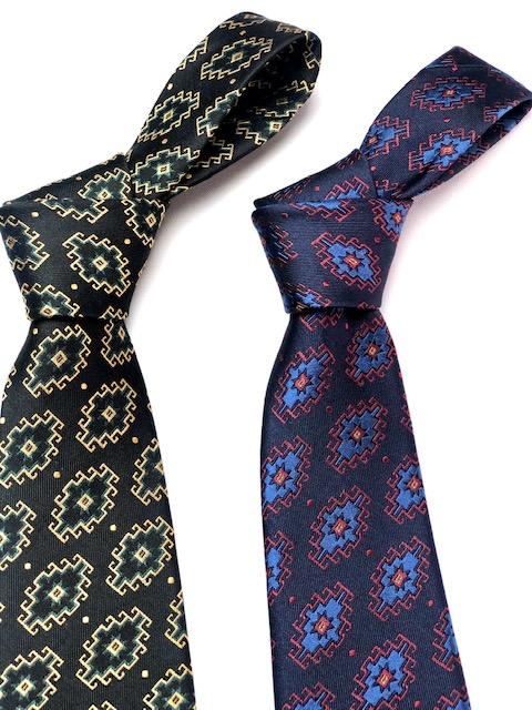 Armenian Rug Silk Neck Tie featuring intricate handmade designs in Navy/Red/Blue and Black/Gold/Green colors, showcasing luxurious silk texture.