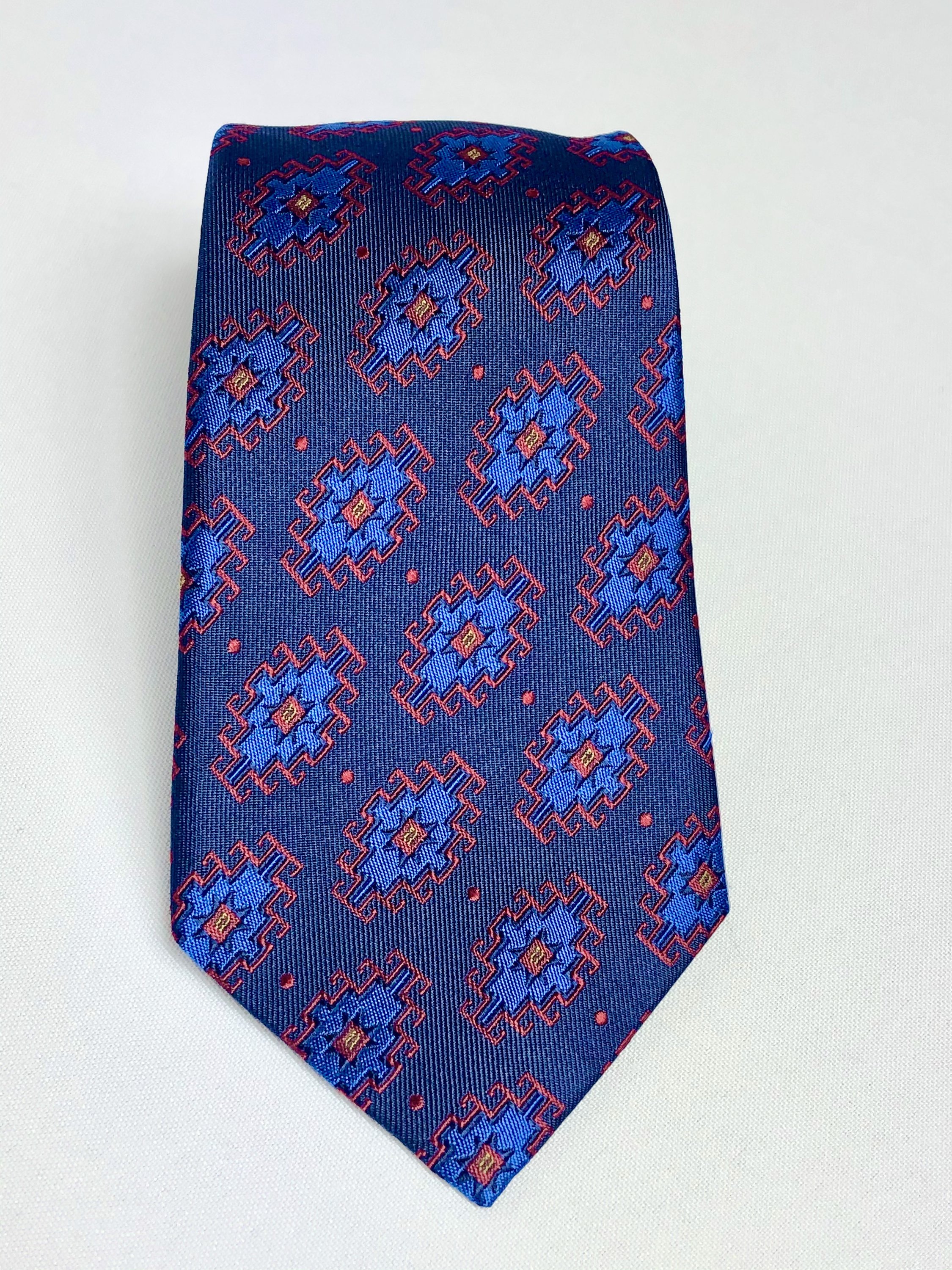 Armenian Rug Silk Neck Tie featuring intricate handmade designs in Navy/Red/Blue and Black/Gold/Green colors, showcasing luxurious silk texture.