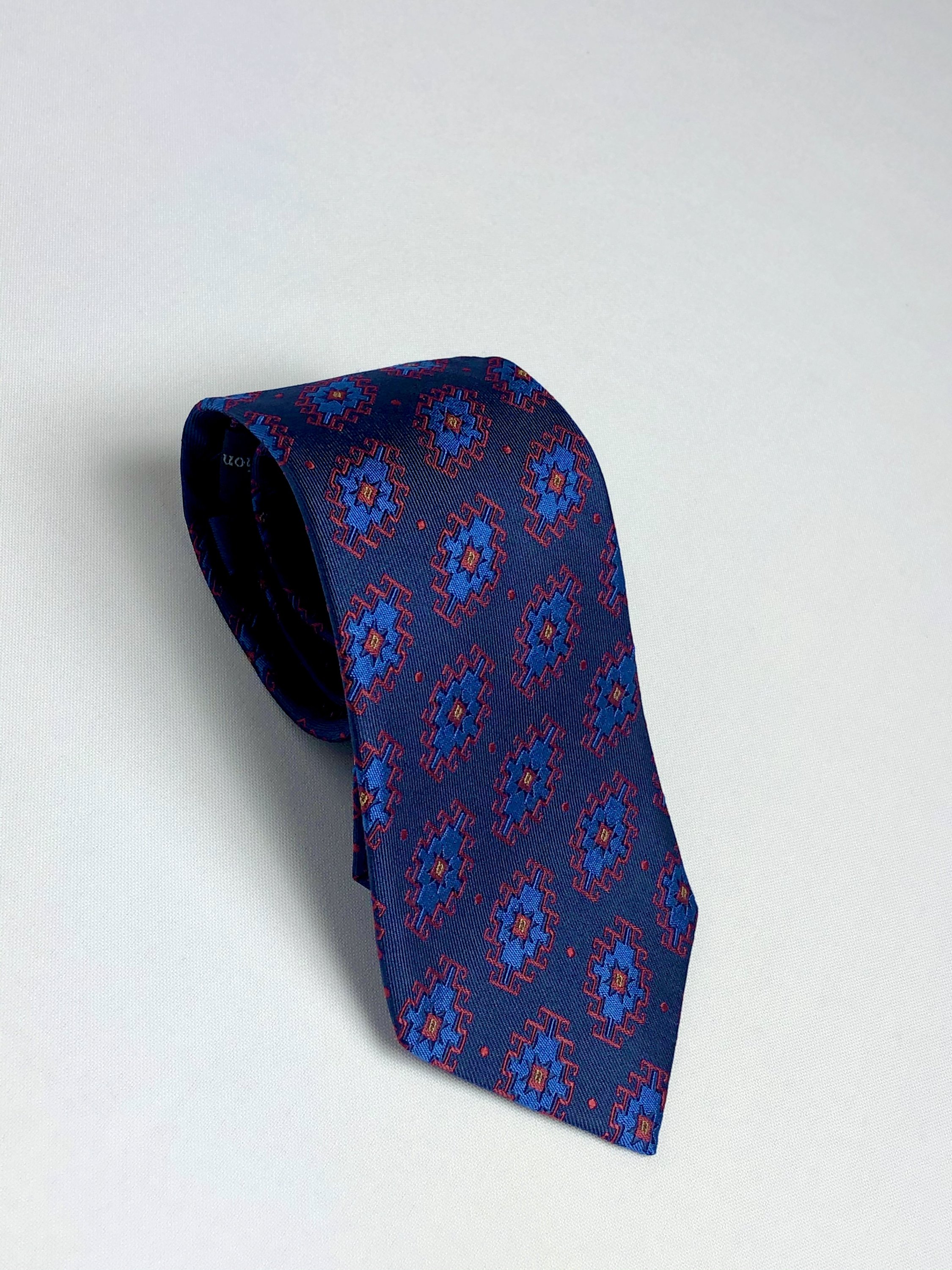 Armenian Rug Silk Neck Tie featuring intricate handmade designs in Navy/Red/Blue and Black/Gold/Green colors, showcasing luxurious silk texture.