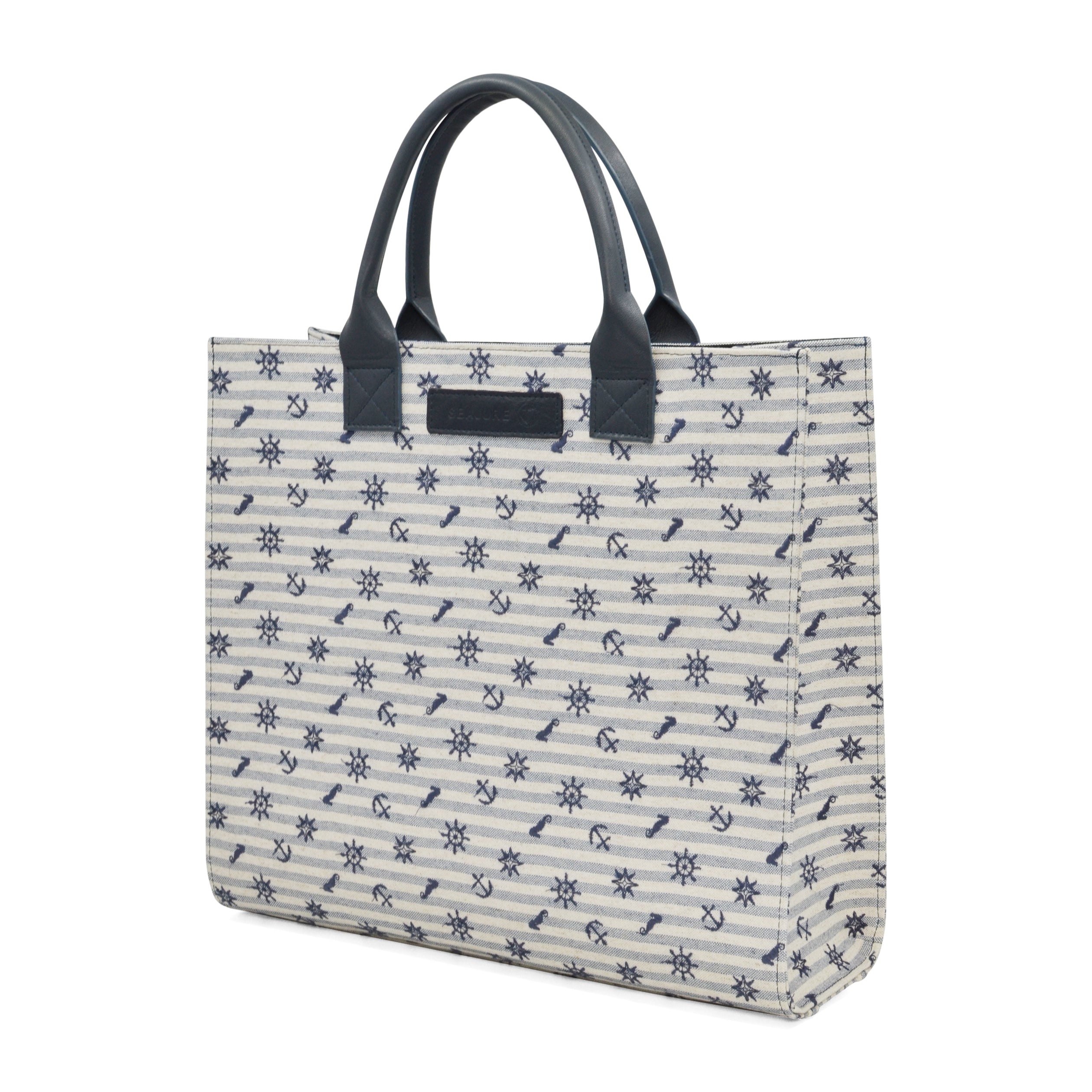 Atol Tote Bag in navy and white linen, featuring embroidered details and premium leather accents, perfect for eco-conscious fashion lovers.