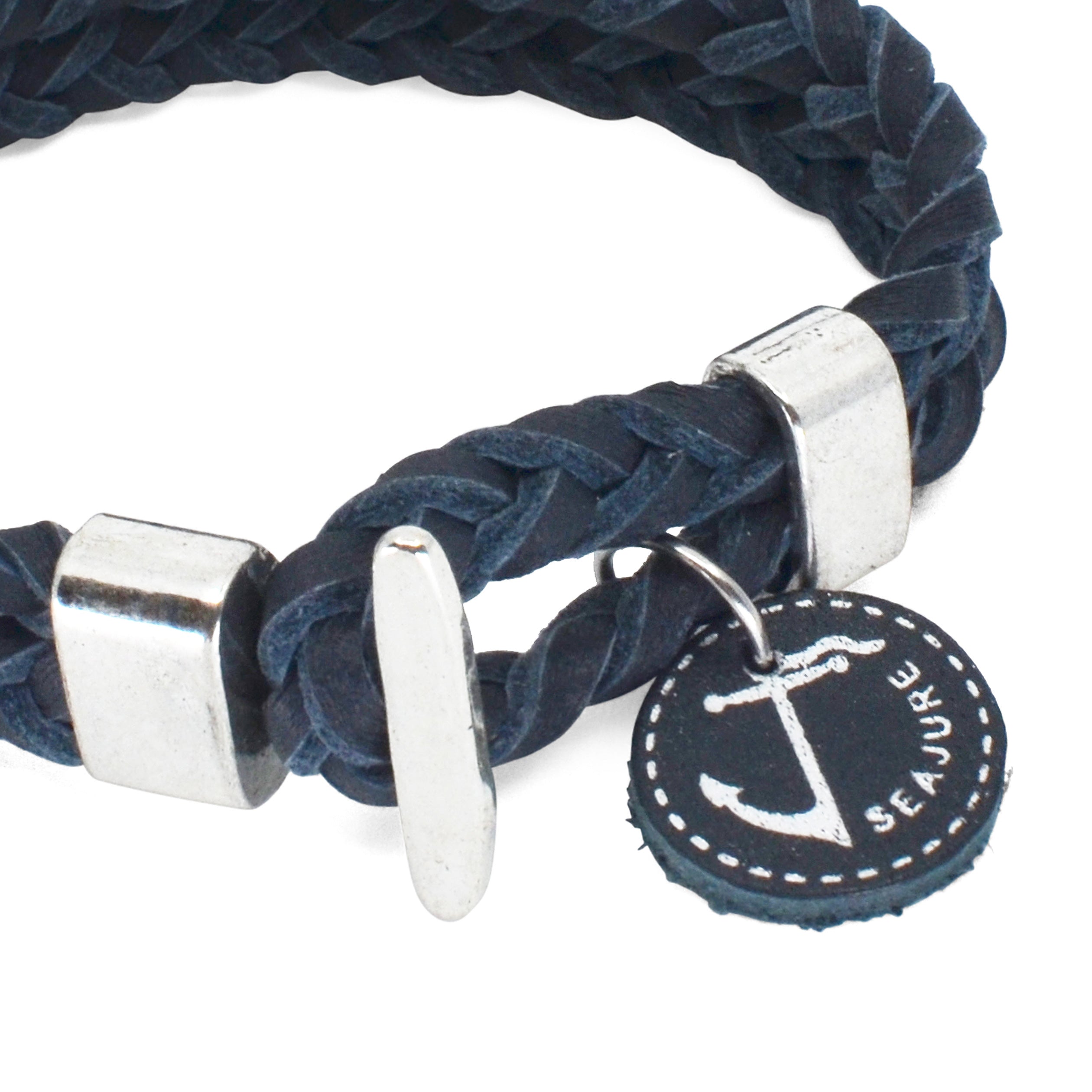 Braided Leather Aruba Bracelet made from genuine vegetable tanned leather with a stainless steel clasp, showcasing a nautical style.