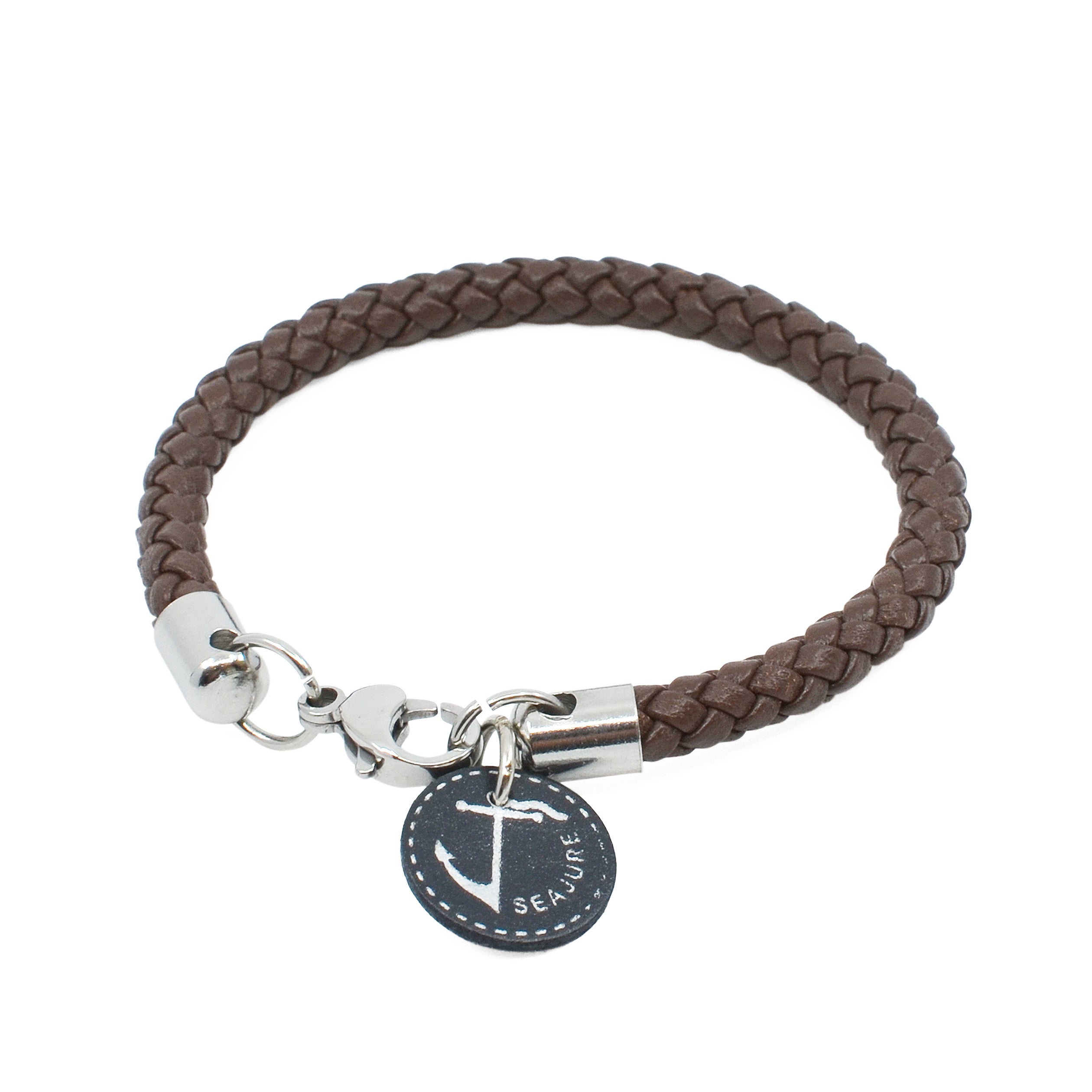 Braided Leather Corsica Bracelet made from vegetable-tanned leather with stainless-steel hardware, showcasing a nautical style.