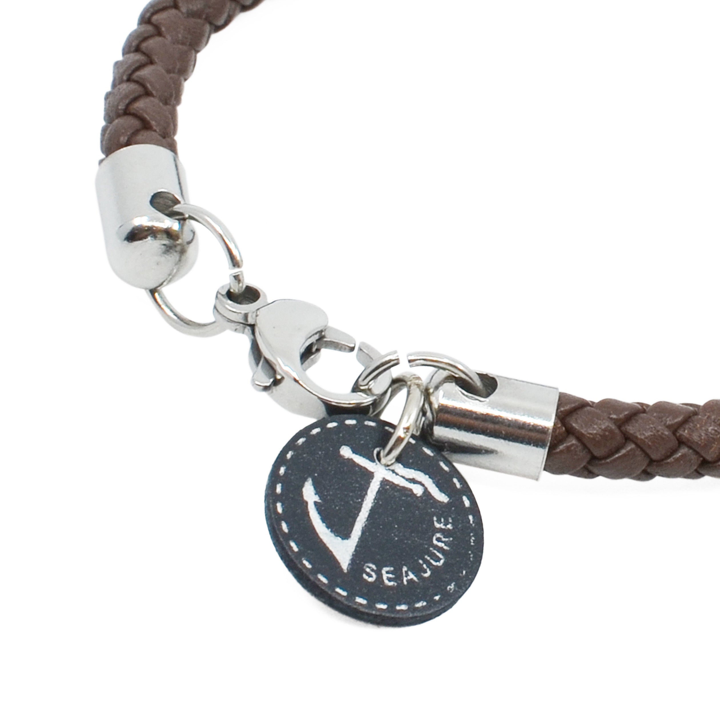 Braided Leather Corsica Bracelet made from vegetable-tanned leather with stainless-steel hardware, showcasing a nautical style.