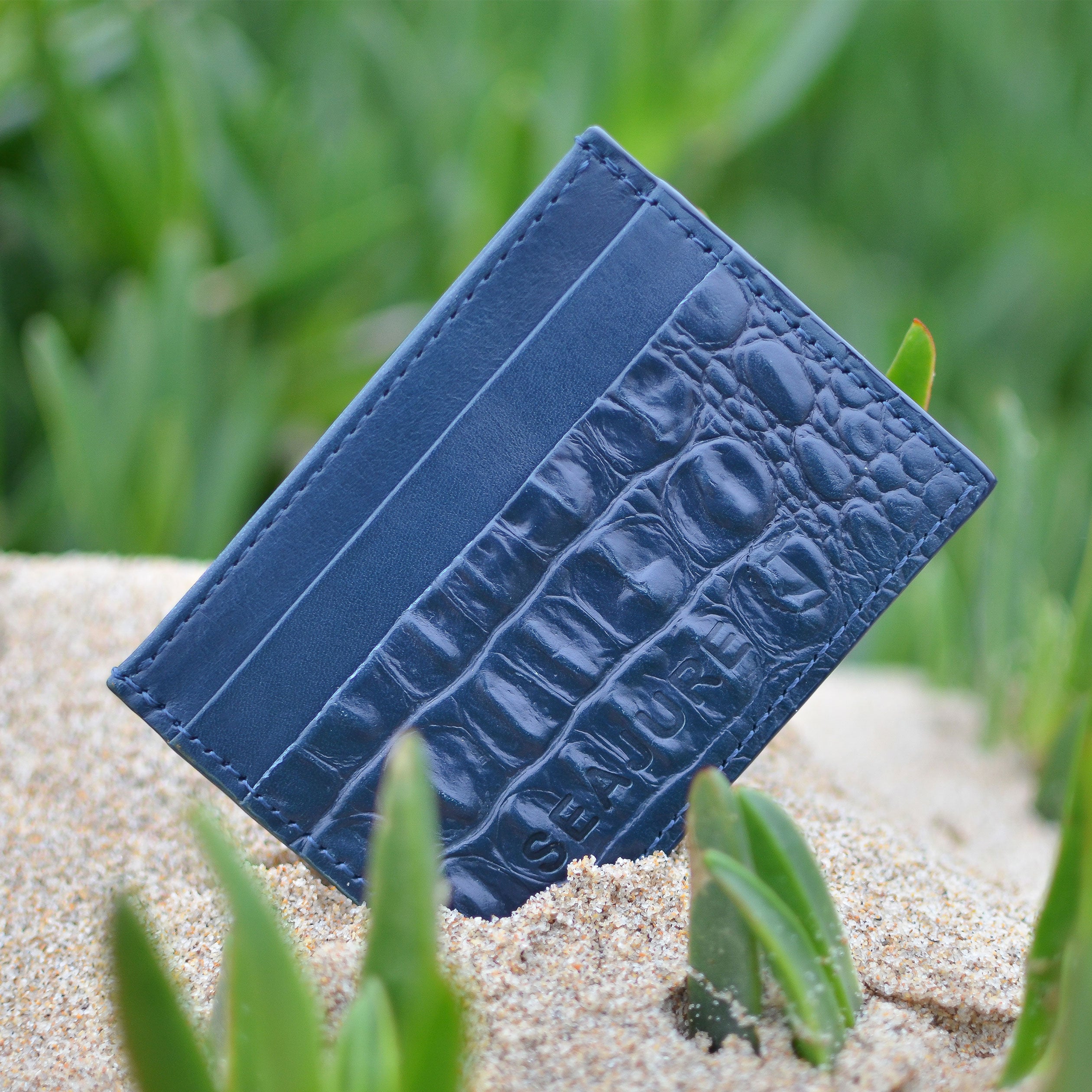 Navy croc embossed leather card holder with tonal stitching and reinforced corners, showcasing premium craftsmanship.