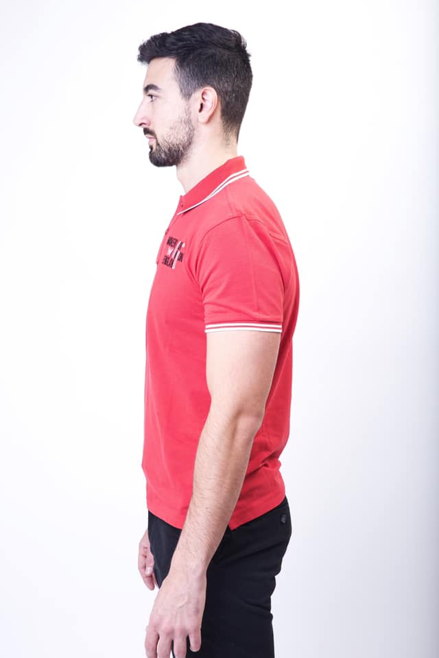 Wakerlook Men's Classic Fit Tipped Polo in red with embroidered logo, featuring a two-button placket and tipped collar and cuffs.