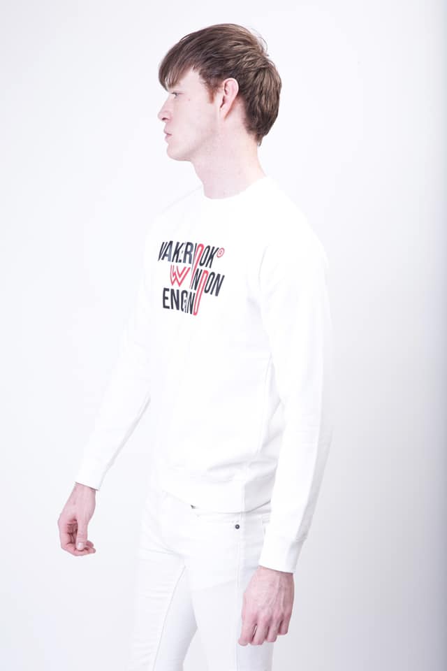 Wakerlook Graduate Heavyweight Sweat in white with stylish front print, featuring raglan sleeves and ribbed cuffs, displayed in a luxury red box.